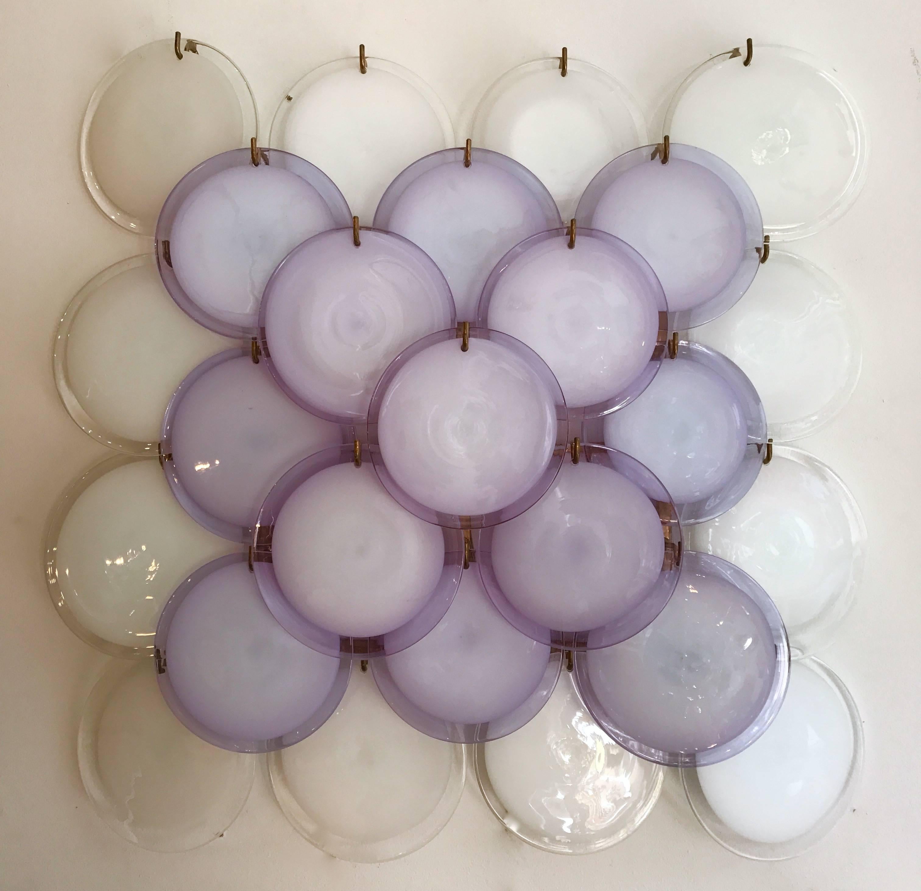 Huge oversize sconces wall panels or wall lights by the editor Vistosi Murano. Really unusual and interesting Parma purple color Murano glass disc. Gilt metal structure. It s a famous maker like Mazzega, Carlo Nason, VeArt, Venini, Poliarte during