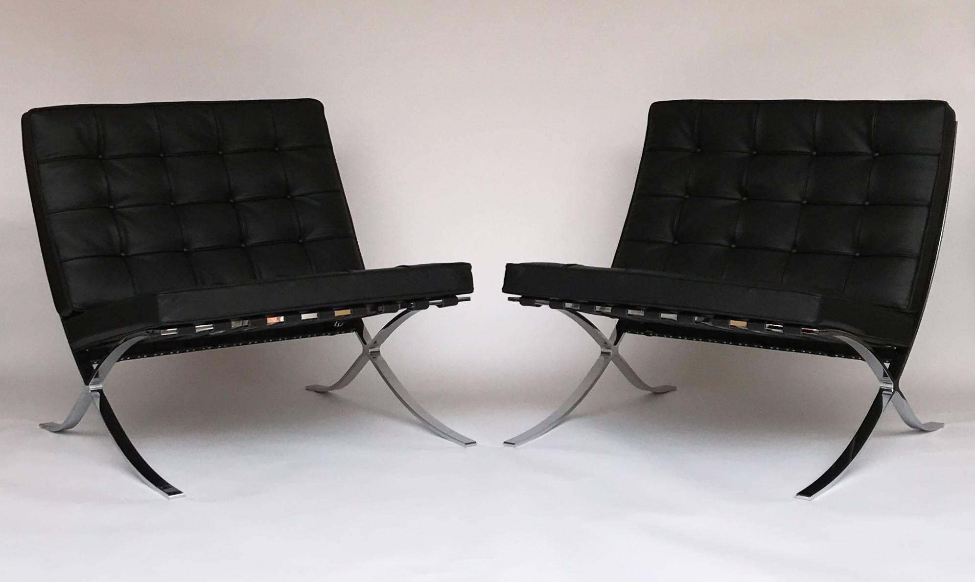 Four armchairs or lounge chairs, living room set model Barcelona in veluto black leather by the designer Ludwig Mies van der Rohe for the editor Knoll. Iconic chair of the 20th century design. Engraved in metal Knoll Studio signature of Mies Van der