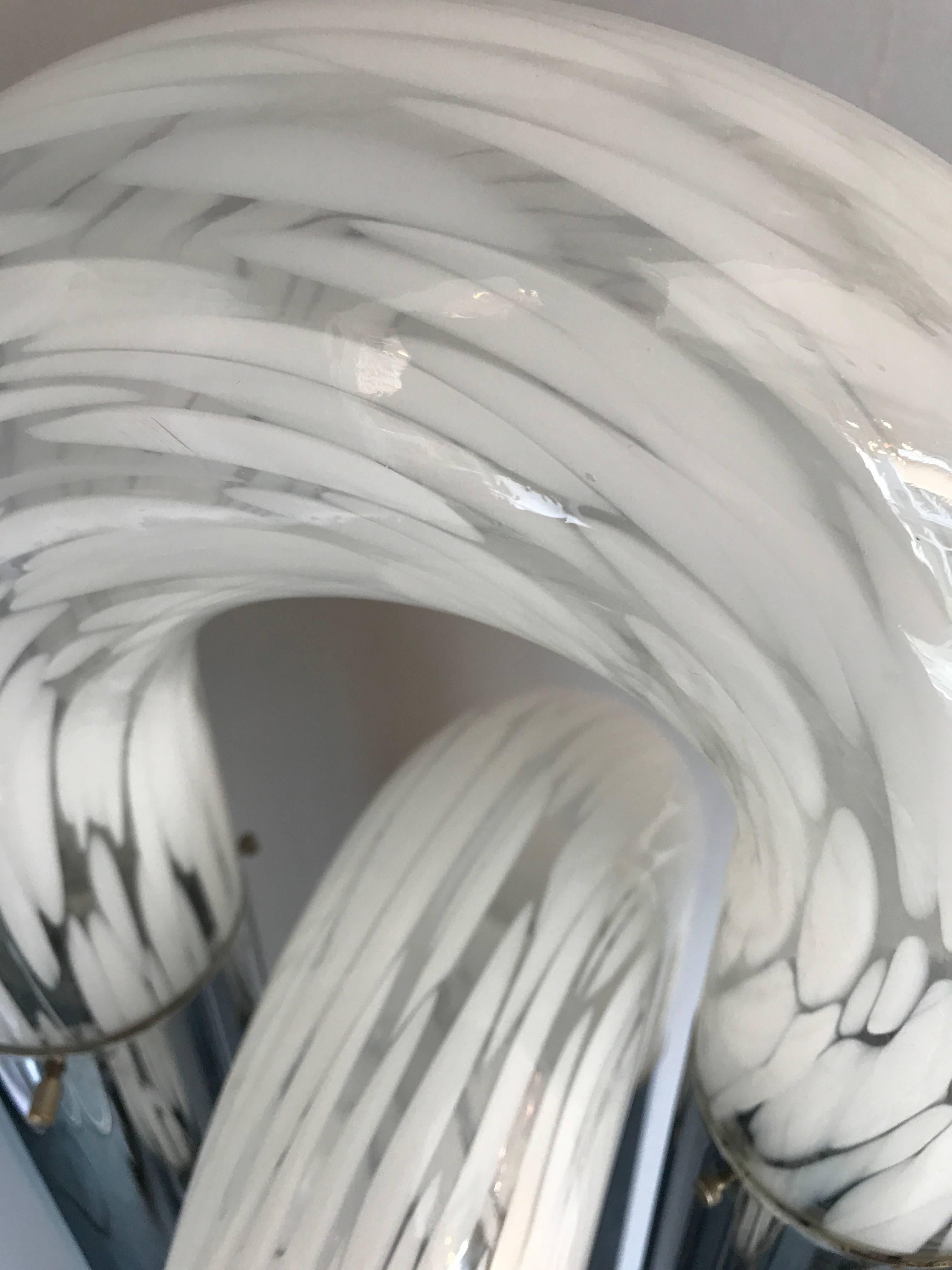 Pair of floor lamps or large table lamps in a variant of the ring model. Typical white Mazzega Murano blown glass. Metal chrome feet base. Famous manufacture like Venini, Vistosi, VeArt, La Murrina, Carlo Nason, Suguso, Artemide, Lumi, Sciolari,