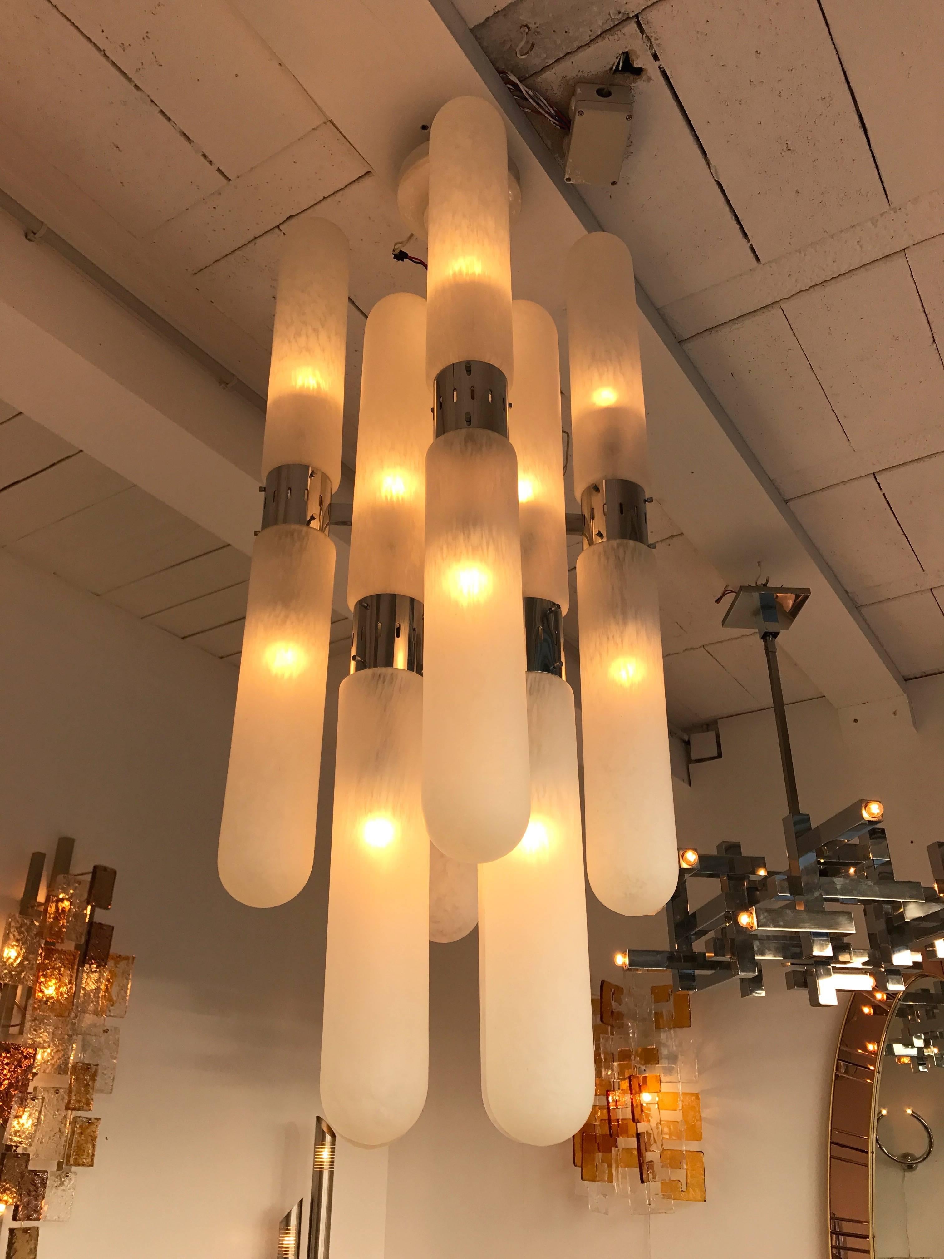 Chandelier huge model of 16 gelules tubes Torpedo chandelier or ceiling pendant light by the editor Mazzega Murano probably design by Carlo or Aldo Nason. Important size for this type of model, Uncommon blown opalin glass by the manufacture. Easily