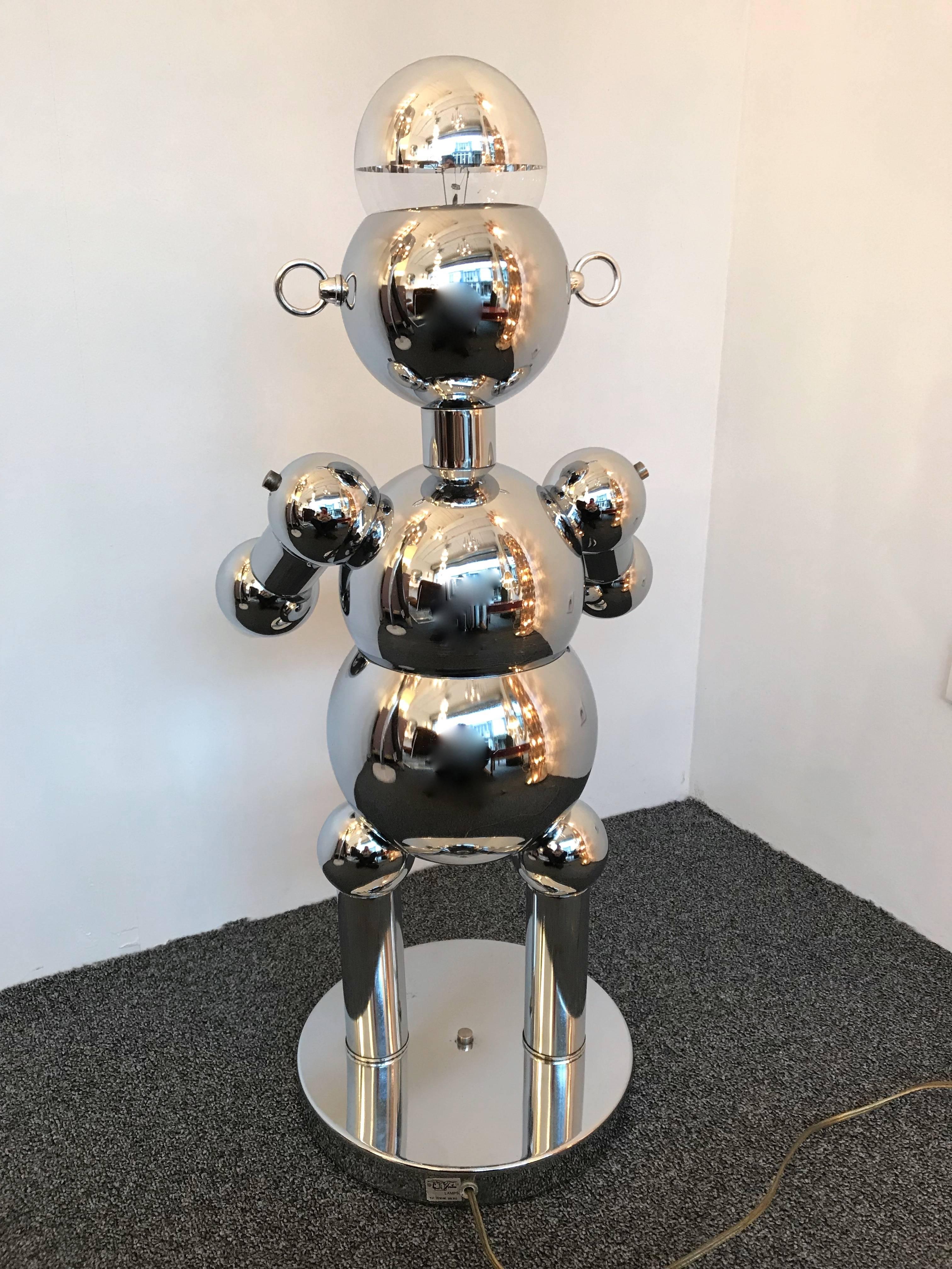 Rare male robot table or floor lamp by the editor Torino Lamp from the collection The Robot Family. Metal chrome, mint condition.