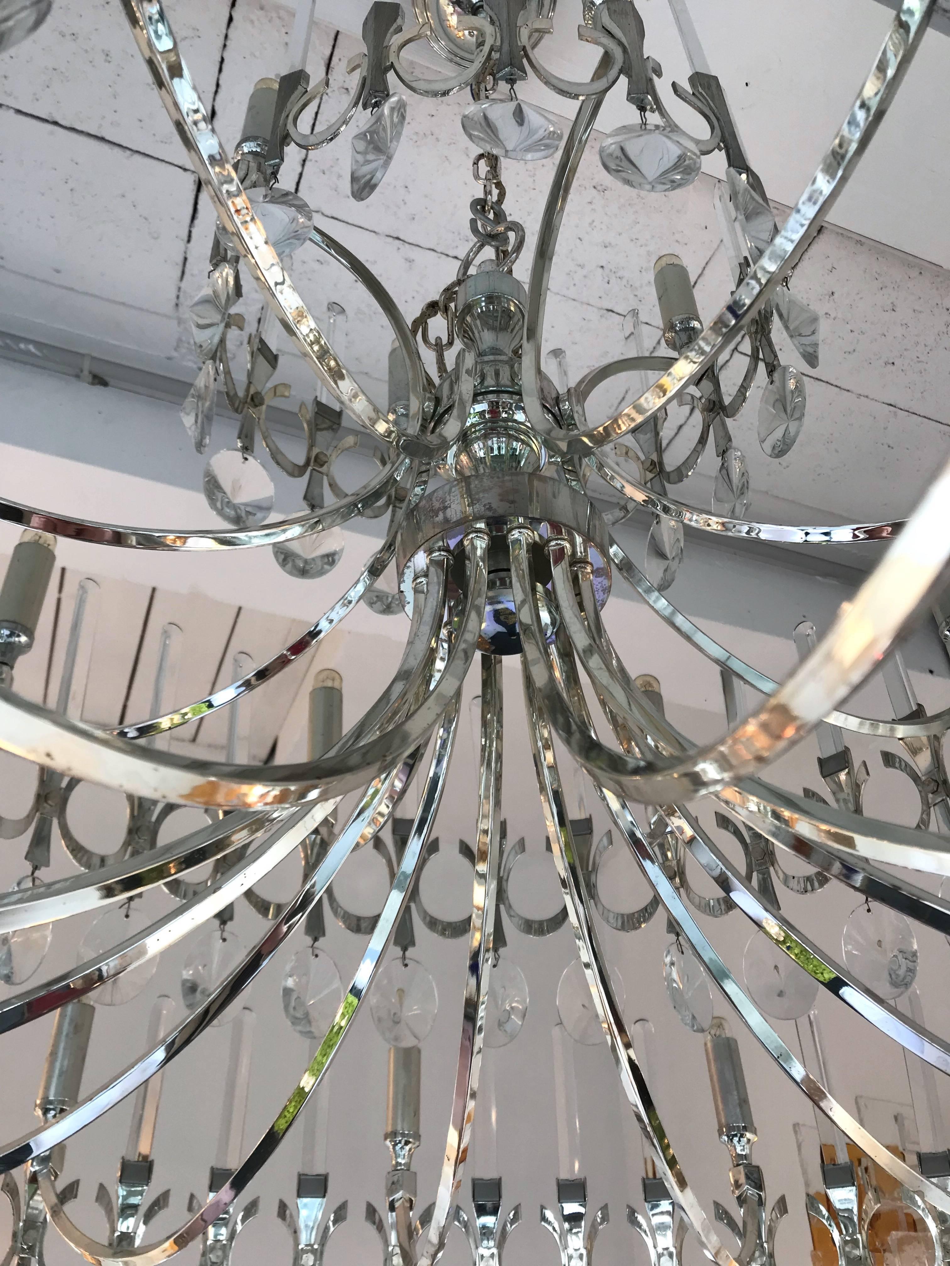 Chandelier or ceiling pendant light by the designer Gaetano Sciolari, rare in this large size of the Ovali model. In a neoclassical style. Original Sciolari stamp. Height 70cms without chain. The pair is available, a second chandelier available.