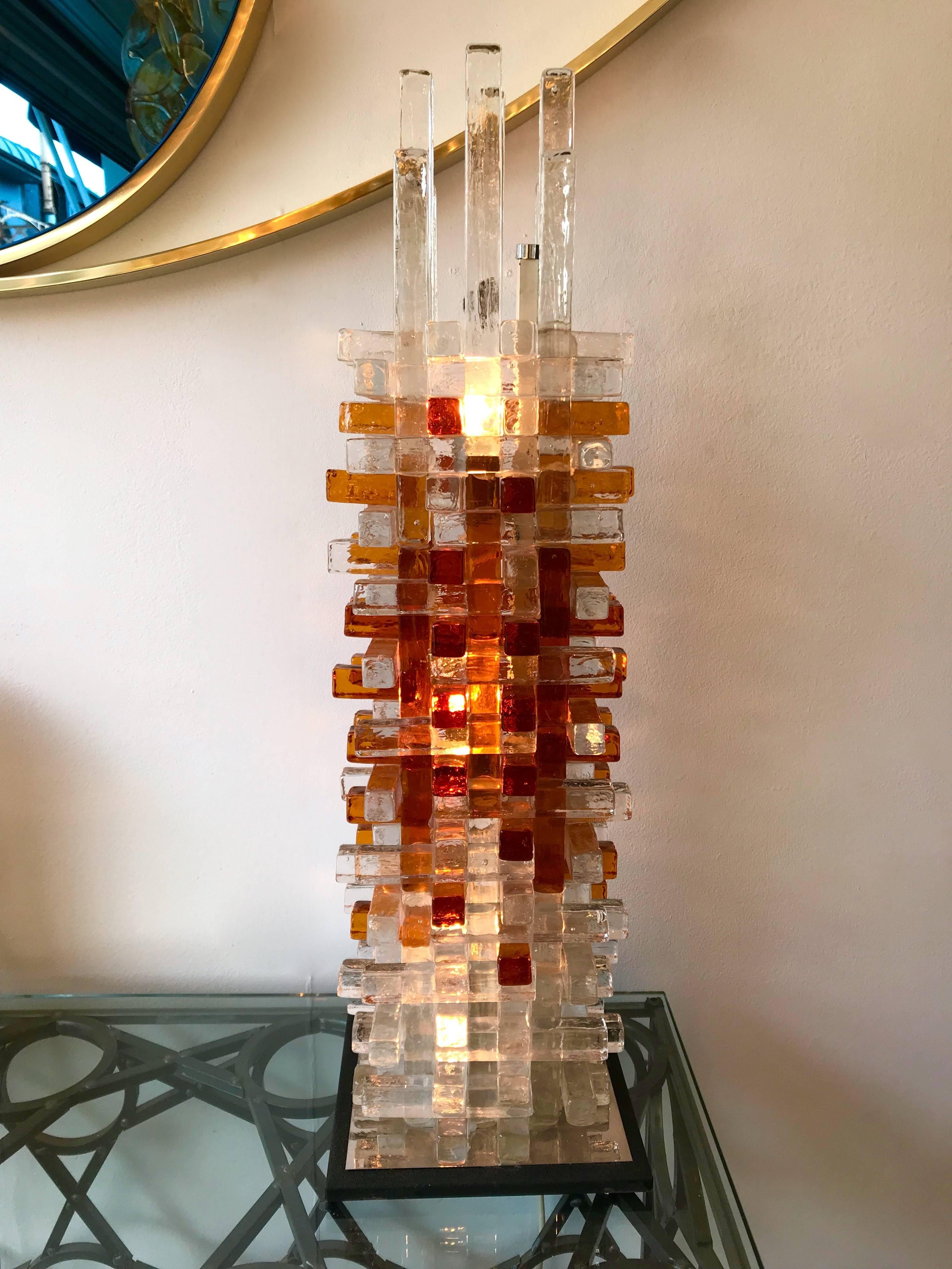 Rare table sculpture lamp by Biancardi and Jordan Arte in Verona, the concurent of Poliarte manufacture during the 70s. Amber and clear pressed glass. Original picture of glassmaker at work during the 1970s show that this is a similar model. Famous