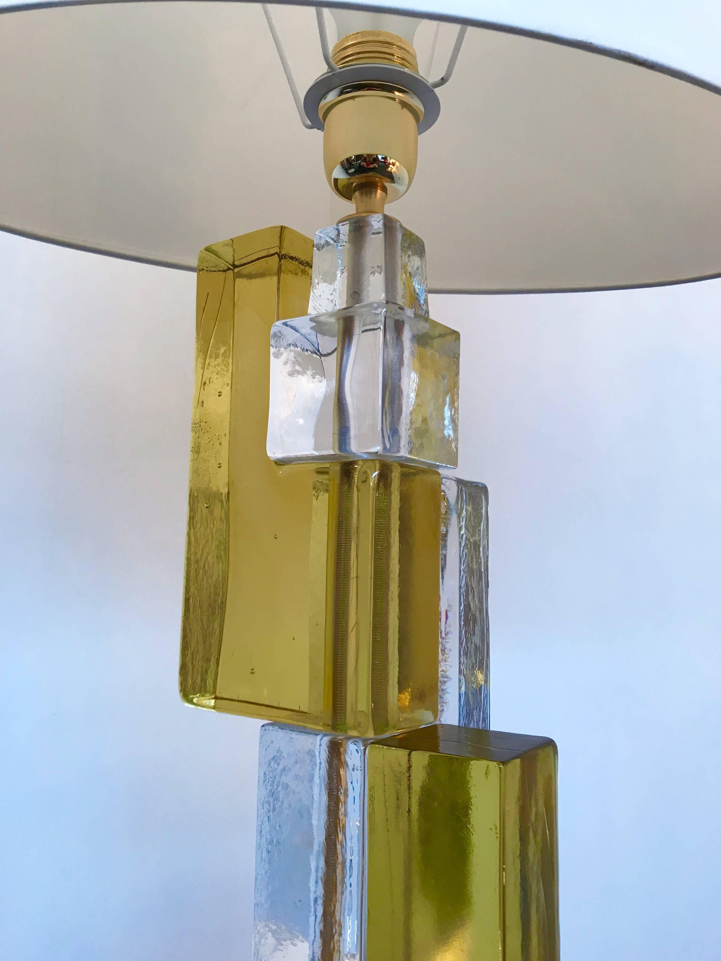 Huge pair of contemporary table lamps cubic pressed Murano glass block. Few exclusive production from a small Italian design workshop. In the style of Mazzega, Poliarte, Venini, Vistosi, Carlo Nason.

Measure: Height top of lamp 73 centimeters.