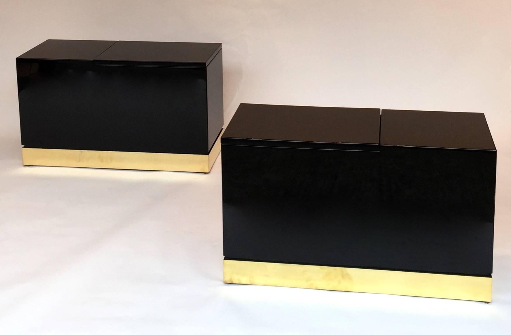 Really interesting model of black lacquered end or side tables trunk or nightstands by Jean Claude Mahey. Base in brass. It can use as low console too. Mahey is one the best references for lacquered furniture of the 1970s, 1980s like Guy Lefevre.