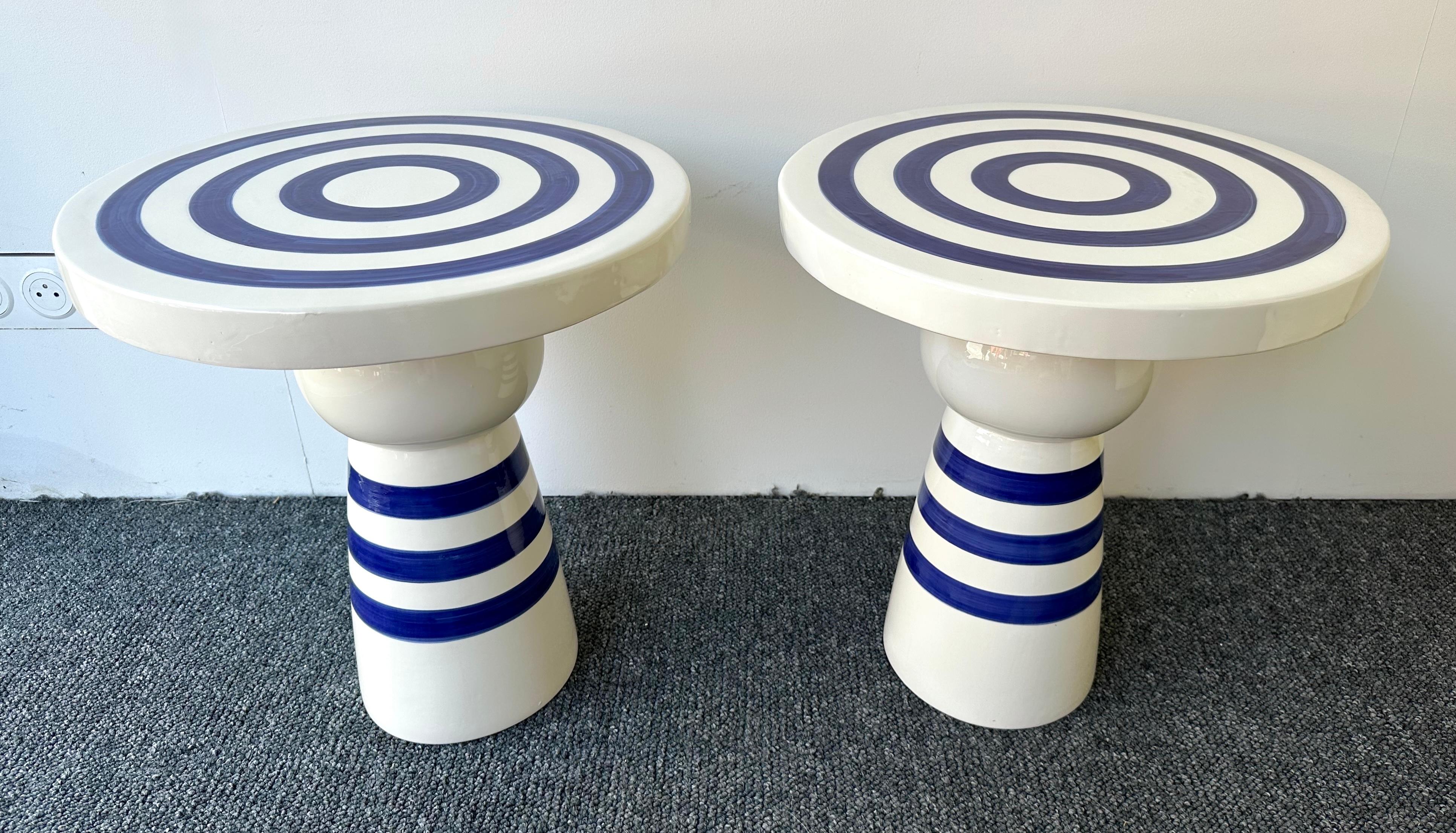 Pair of blue and white stripe decor ceramic terracotta side end low coffee cocktail bedside tables or nightstands. Italian design workshop,  Minor imperfections due to artisanal Handmade work. In the mood of Mid-Century Modern Mario Botta, Memphis