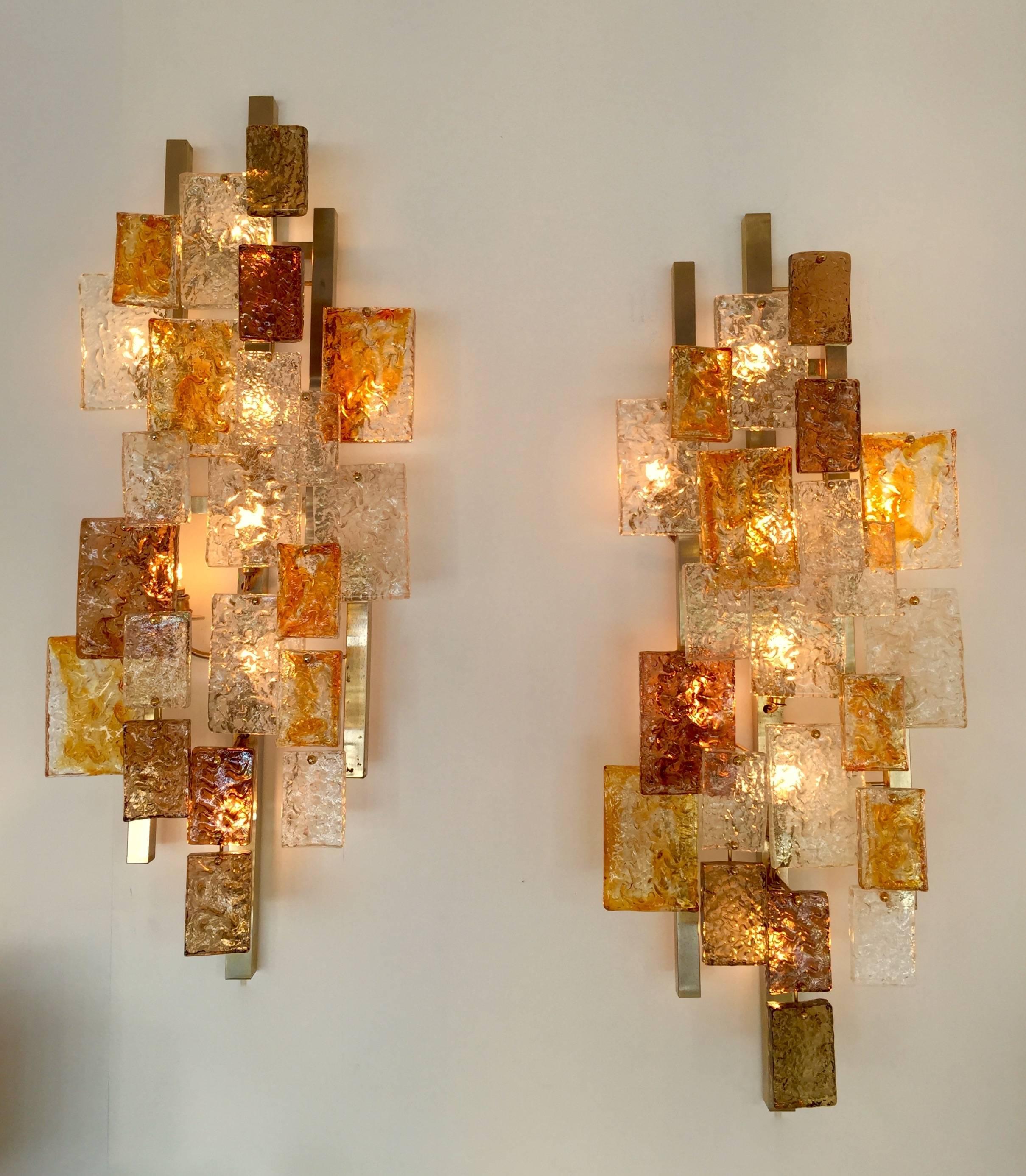 Huge pair of Mid-Century Modern or space age hanging Murano pressed glass sconces or wall lights by the manufacture VeArt, 1970s. Complex glass construction for wall light of this period. Very rare by the size and color glass. An italian design from