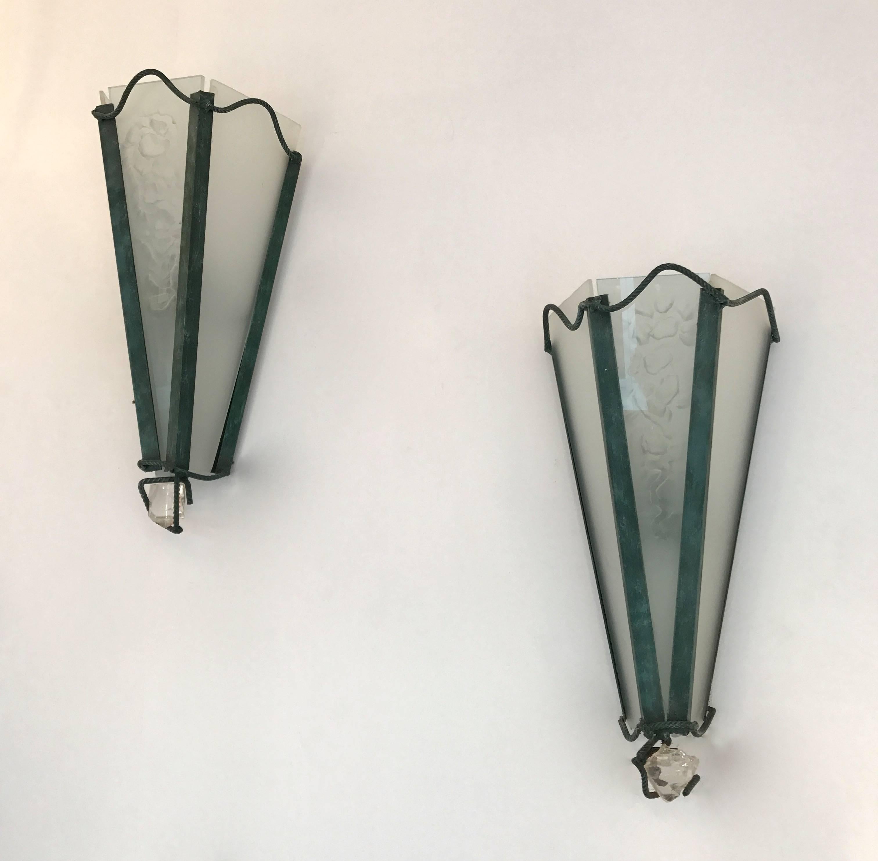 Pair of sconces by the artist Marco de Gueltzl (1958-1992). Green patina metal, opalin glass. Few works known of the artist. In an Art Deco style like Jean Royère, Jean Michel Franck, Jean Perzel, Sabino, Desny, Schneider, Ezan, Muller, Degué.