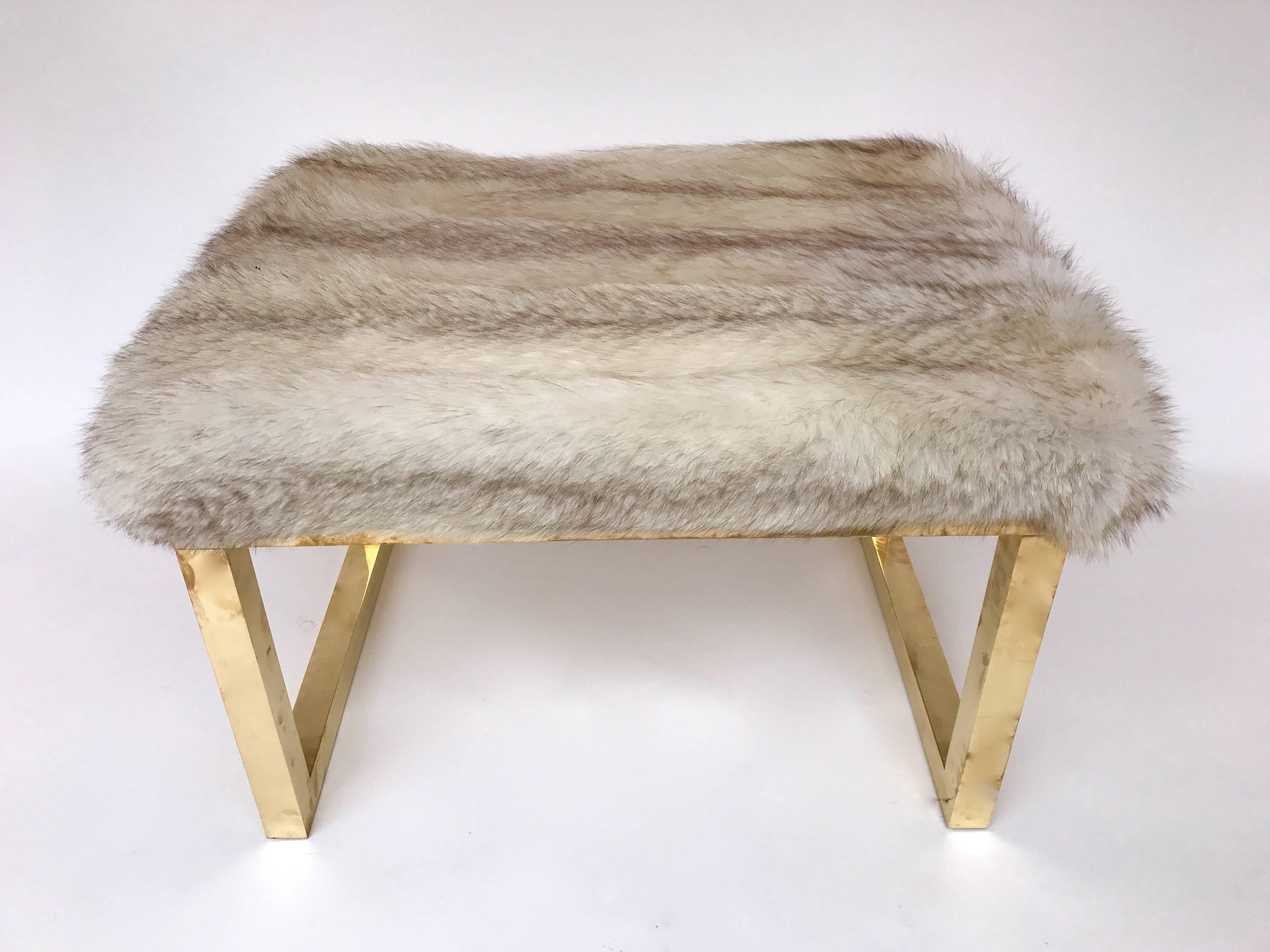 Contemporary pair of poufs or stools. Full brass and natural silver wolf fur. Generous size can be use as banch. In the style of Maison Jansen, Romeo Rega, Hollywood Regency, Willy Rizzo
