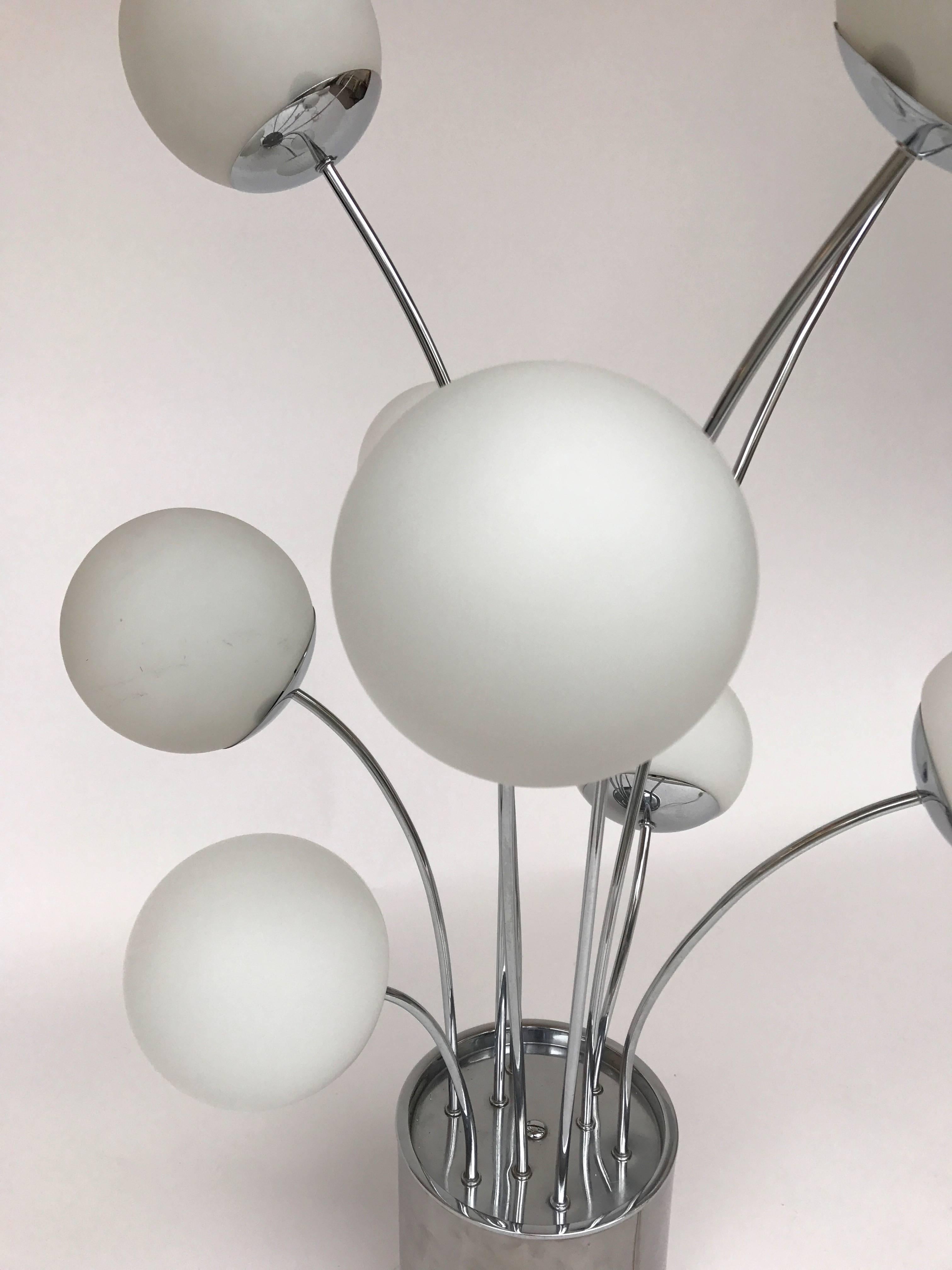 Rare table or floor lamp by the designer Pia Guidetti Crippa for the editor Lumi, metal chrome version opalin glass ball. Famous manufacture like Sarfatti, Artemide, Arredoluce, Sciolari, Reggiani, Arlus, Stilnovo, Hollywood Regency.
   