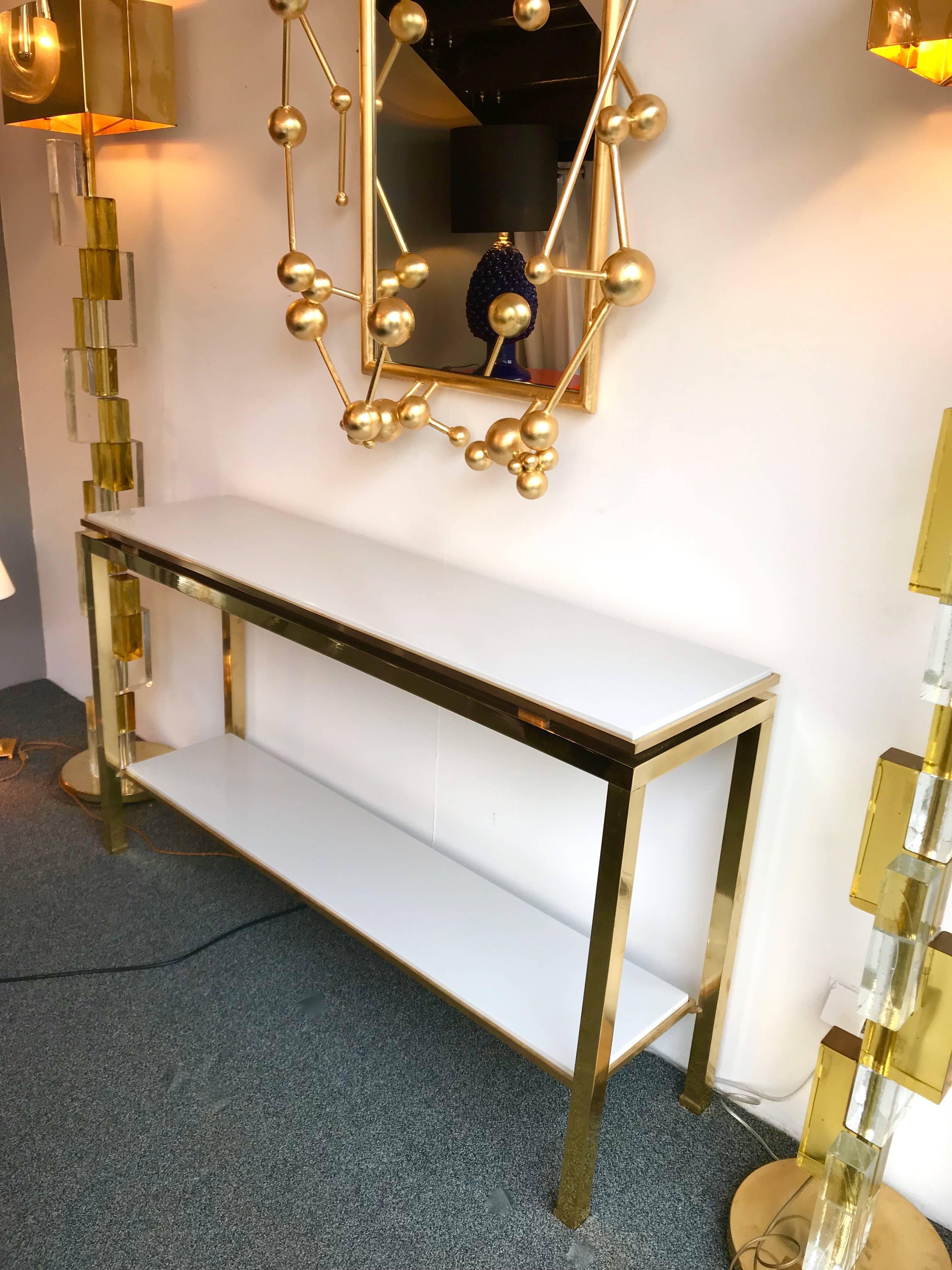 Long model of console table by the designer Guy Lefevre for Maison Jansen, full brass, double light grey lacquered wood top. Famous manufacture like Jean Claude Mahey, Romeo Rega, Bagues, Willy Rizzo, Mario Sabot and Hollywood Regency.