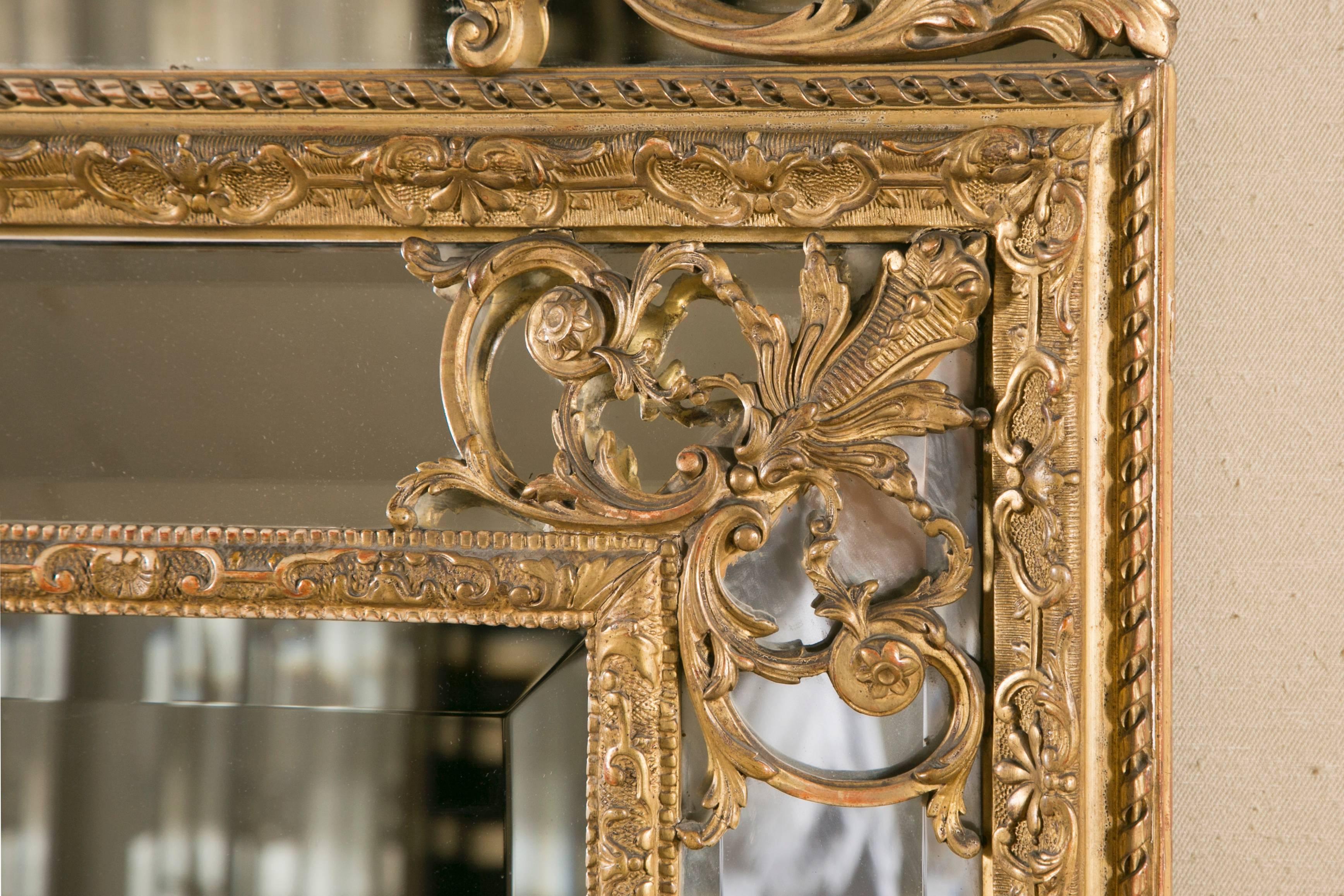 20th Century 19th Century French Regence Style Carved Giltwood Mirror with Parcloses For Sale