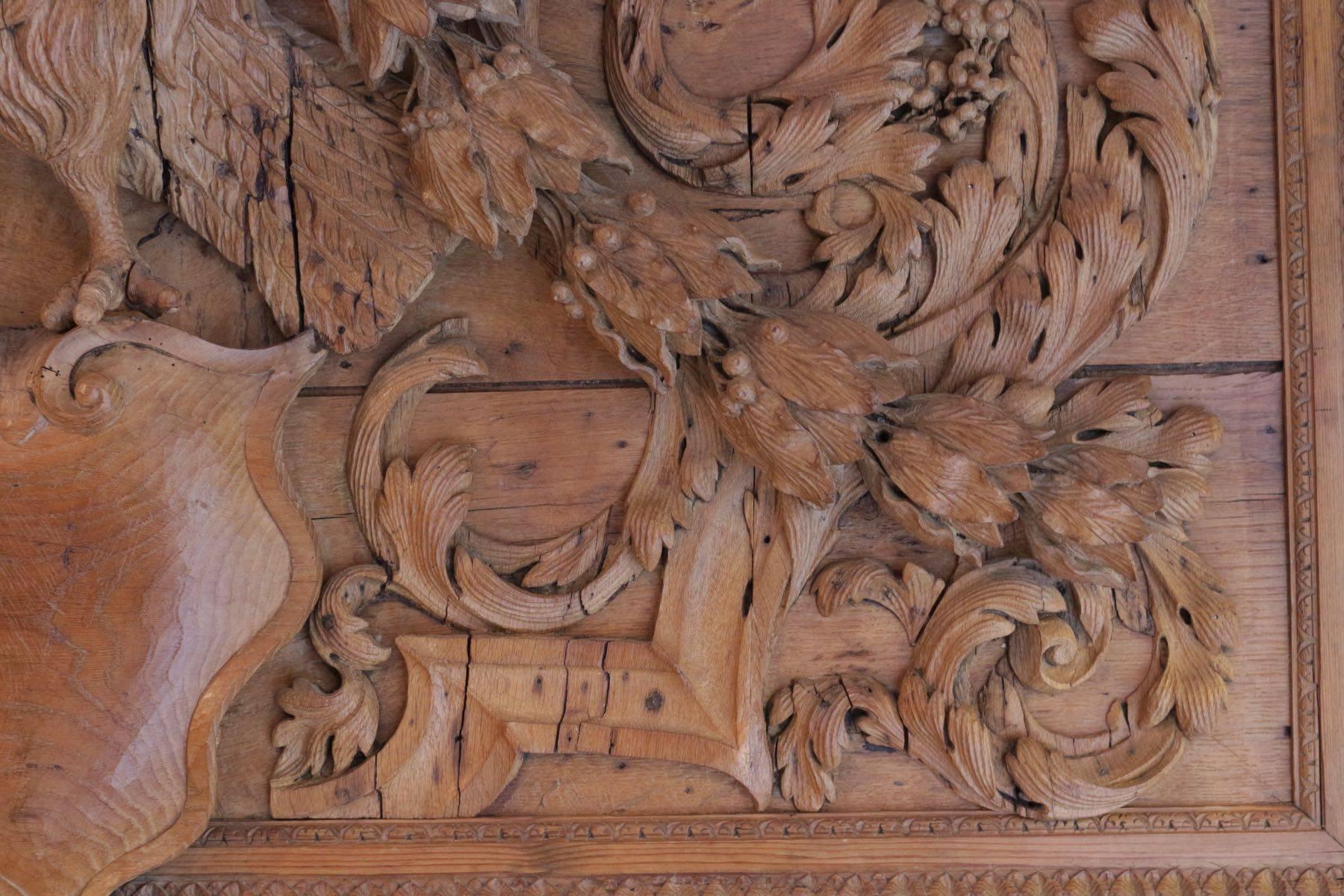 Empire Open Wings Oak Eagle Seated on a Coat of Arms in a Wall Panelling