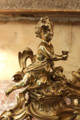 Pair of French Rococo Gilded Bronze Endiron with Putti, 19th Century