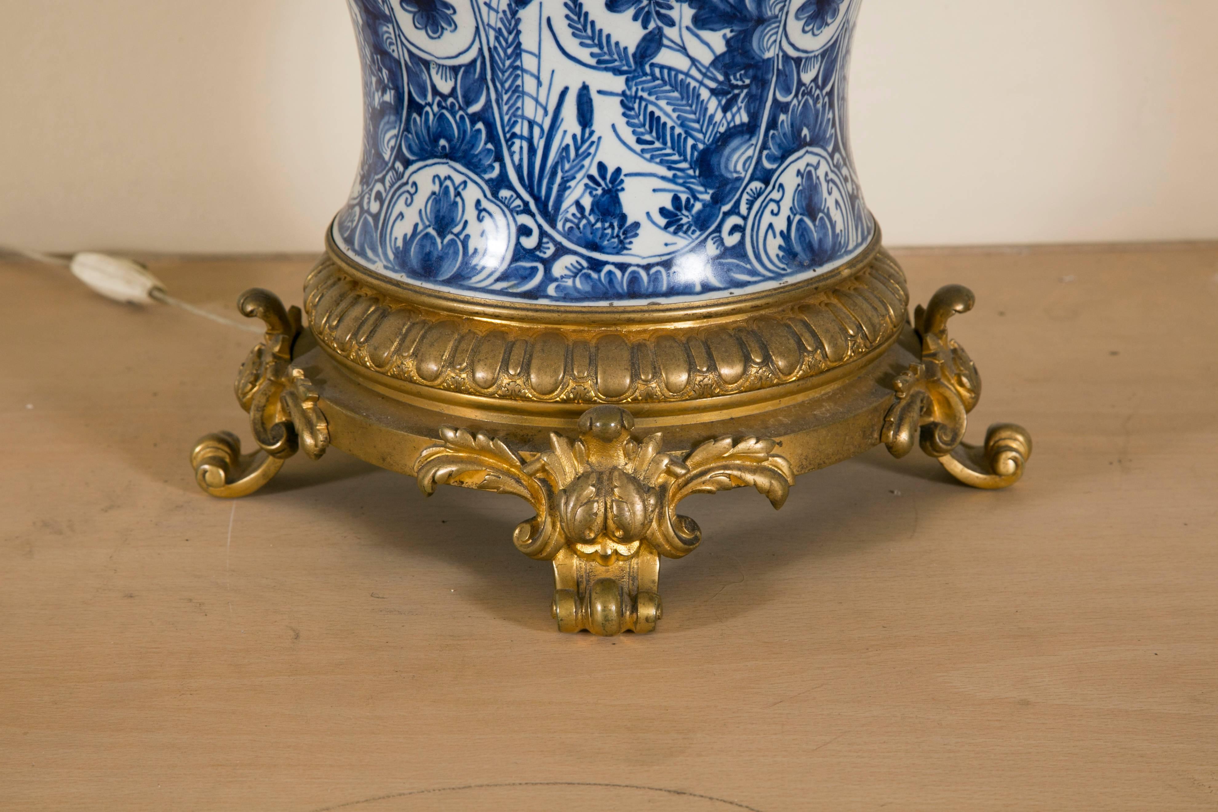 Dutch Colonial 19th Century Delft Vase Lamp Mounted on Gilt Bronze Base and Top For Sale