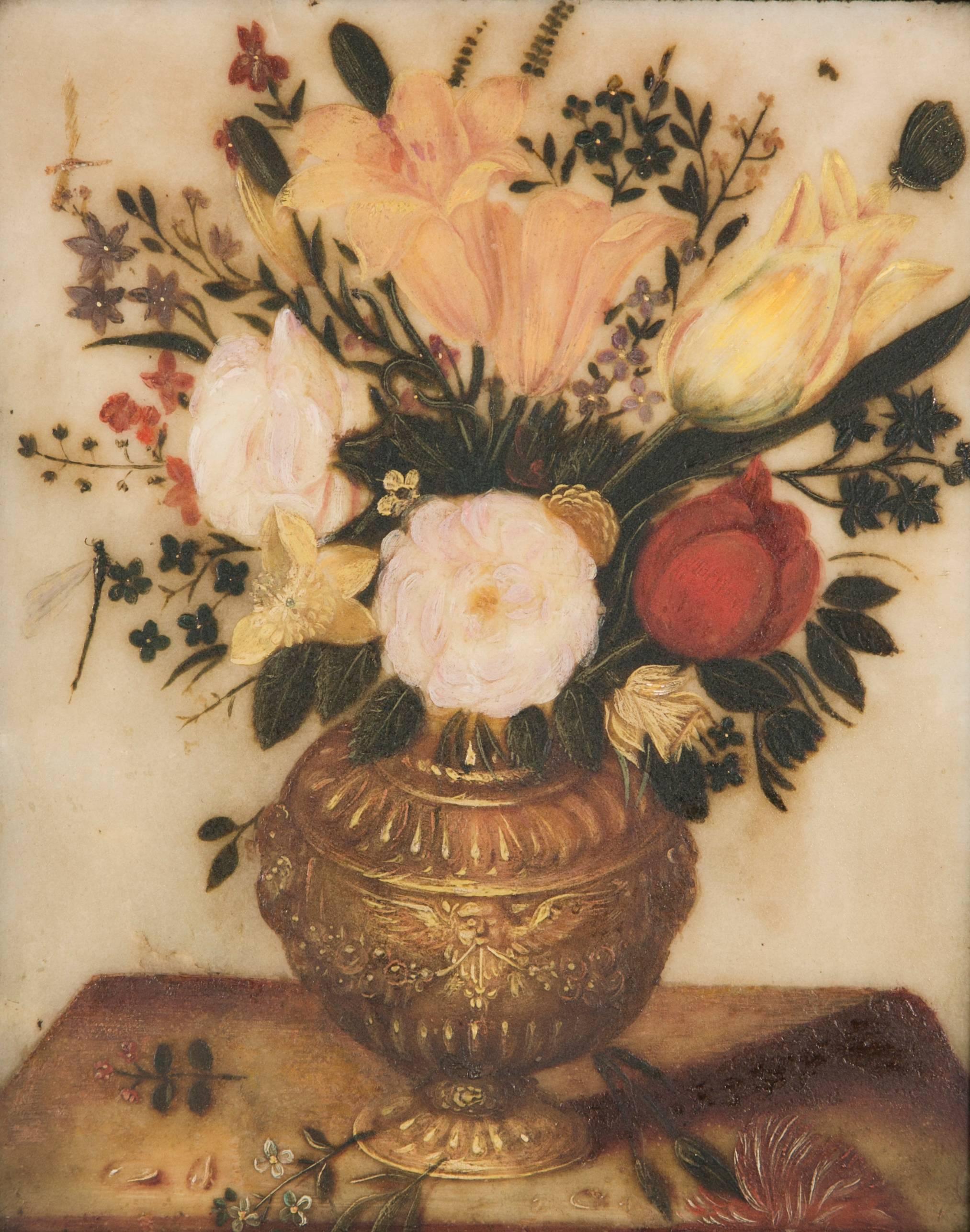 Very beautifully executed and pretty flowers bouquet laid down on a table, in a brass dinandry vase
17th century Spanish painting on a white marble base framed by an ebonized
18th century wooden frame

Frame sizes: H 34 cm x W 29 cm.