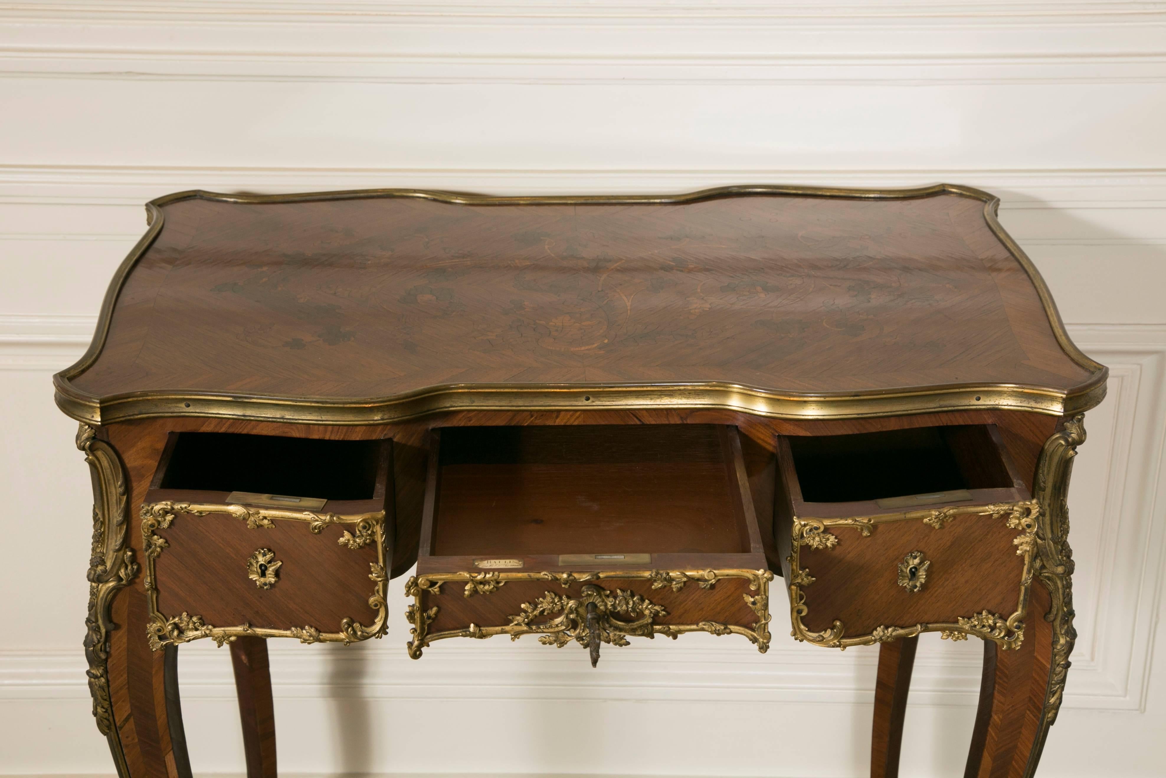 19th Century French Kingwood Marquetry and Ormolu Mounted LXV Style Table Signed Raulin For Sale