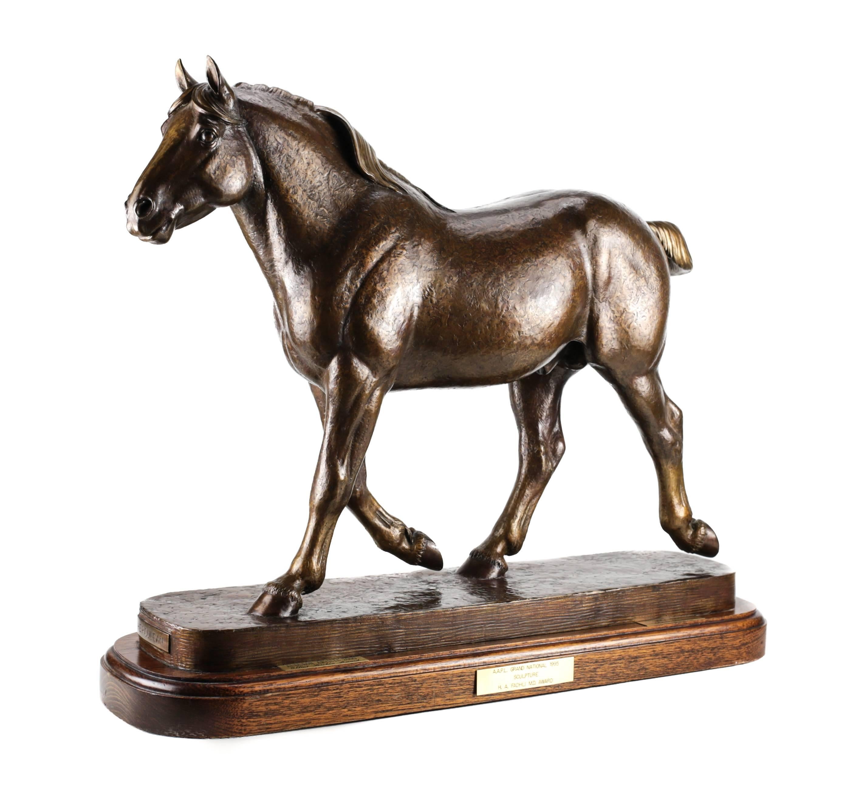 A large and formidable patinated bronze sculpture of a trotting stallion, modeled with life like qualities by American sculpture Marilyn Newmark (1928-2013.) 

This sculpture is part of a very limited edition of only five examples, the artist