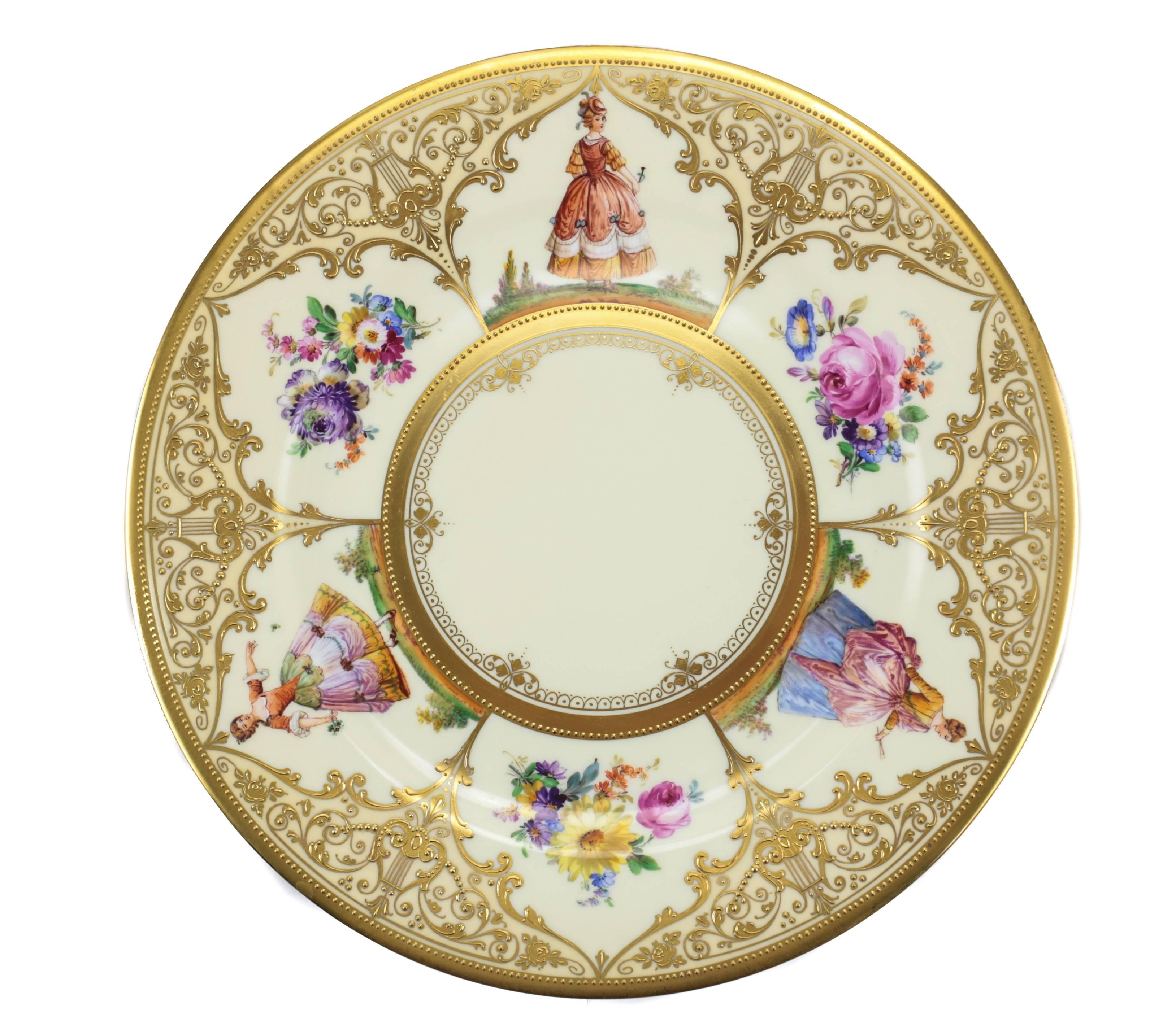 A very attractive set of twelve large Dresden cabinet plates by Ambrosius Lamm, colorful and vibrant hand-painted interchanging panels of floral bouquets and ladies in Victorian dress, forming a six pointed star or snowflake. The borders heavily