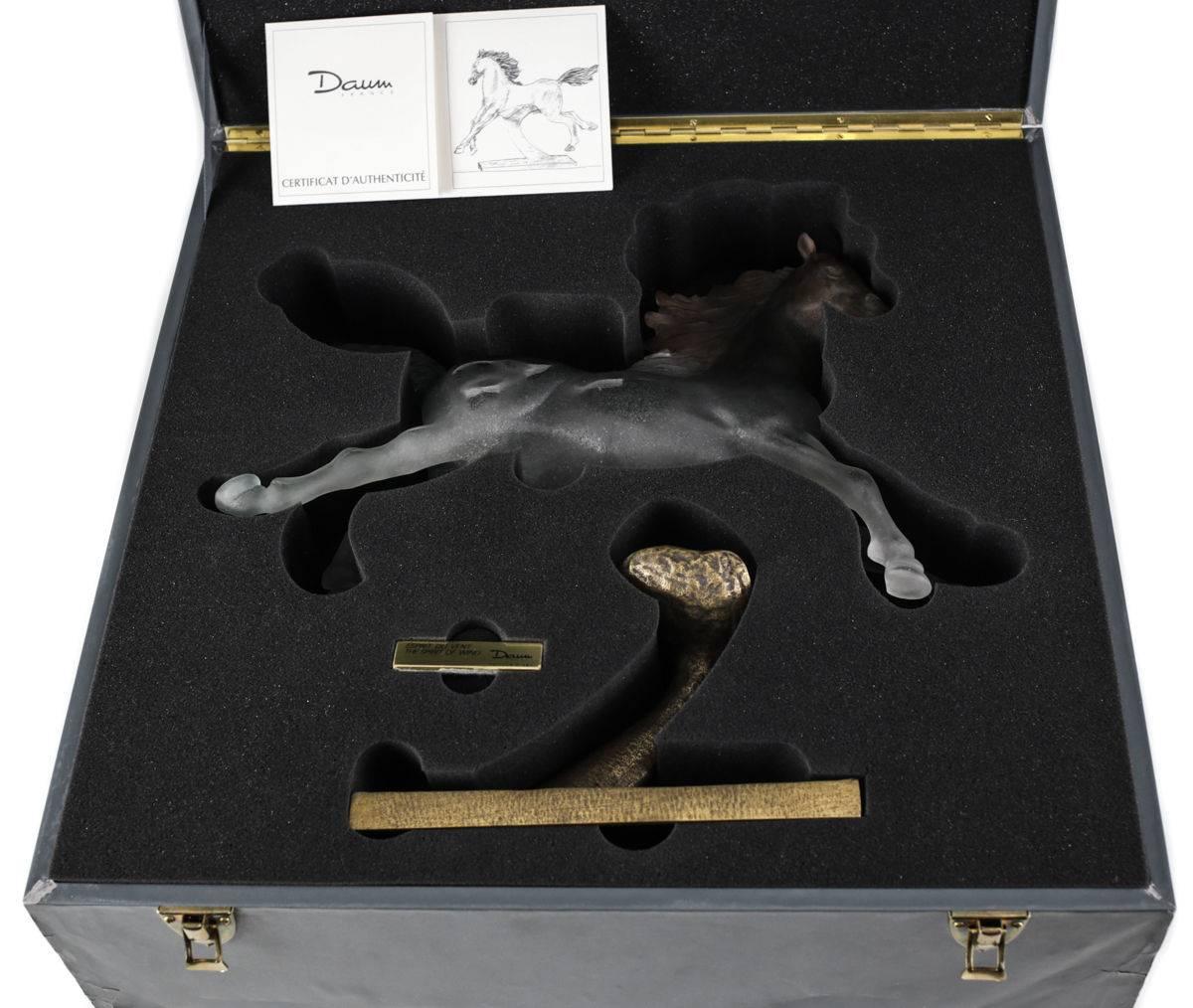 A very rare "Esprit Du Vent" or "The Spirit of Wind" art glass sculpture of a running stallion using the Pate De Verre (molded within a kiln) method by Daum Nancy, France. This piece is part of a limited edition series of only