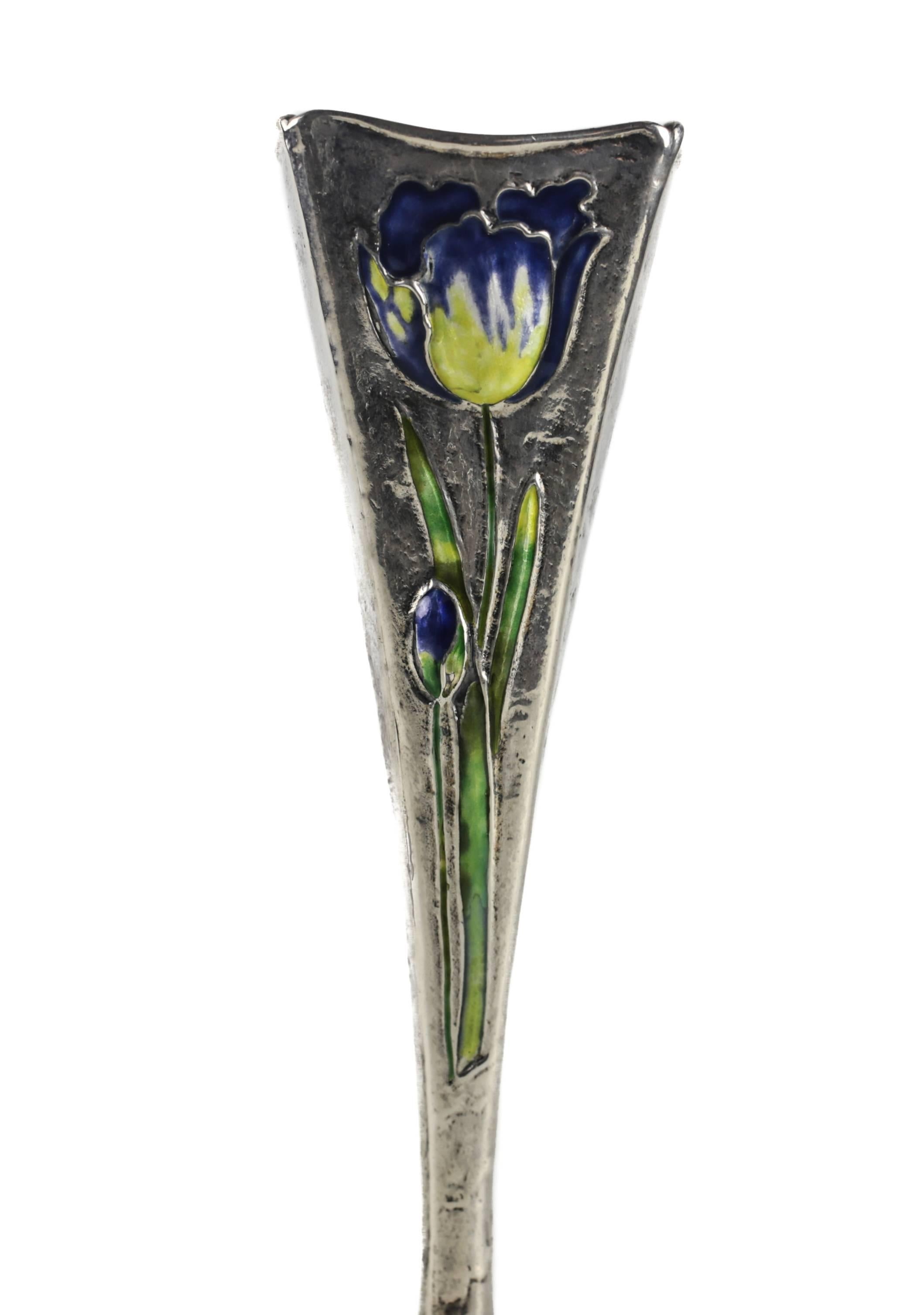 A stunning late 19th century Art Nouveau sterling silver vase with an embossed floral silhouette to two sides, the face with hand applied enamel decoration, a rarely seen technique by Gorham. Three color enamel consisting of green vines with yellow