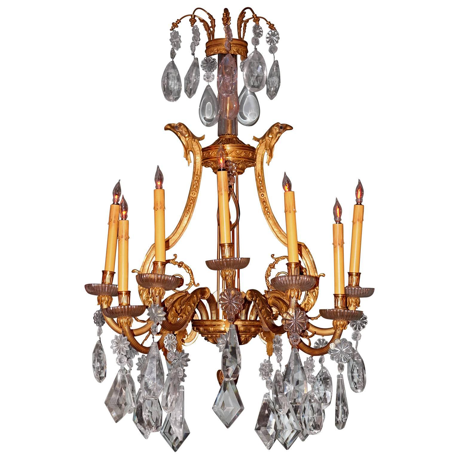 This pair of massive antique French sconce are in great used condition. The ormolu on the bronze combined with extra large cut crystal hanging from the lights makes them exquisite. All the arms are moveable to different directions.