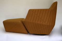 Ultra Modern Ligne Roset Facett Swivel Armchair and Matching Ottoman