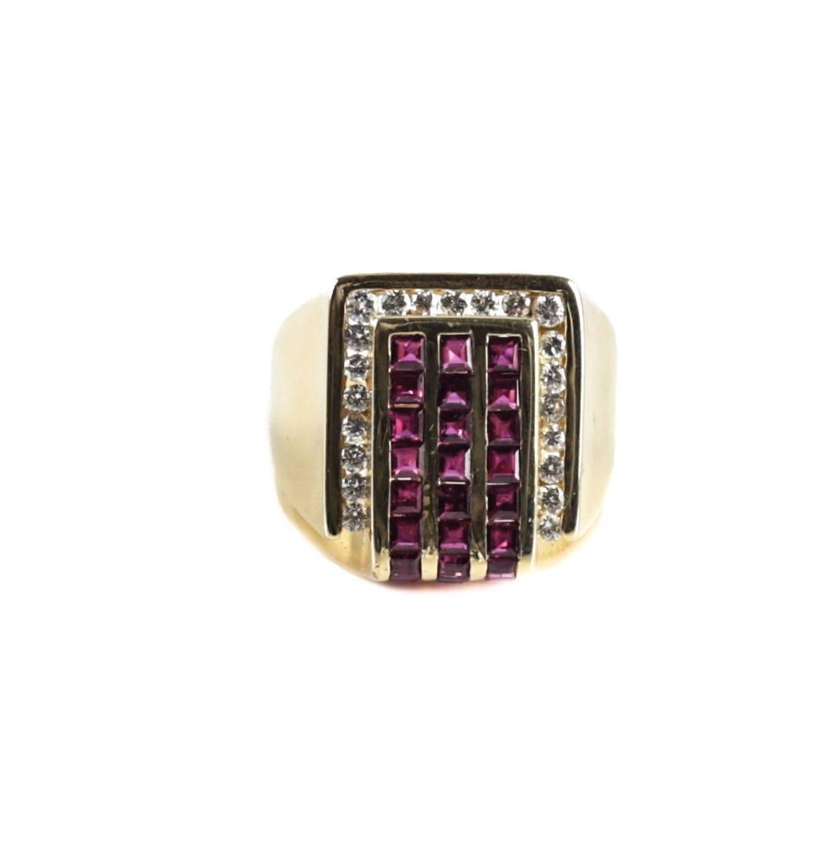A high quality ruby and diamond ring mounted in 18 karat yellow gold by Charles Krypell. 30 square cut rubies with 21 round cut diamonds. Marked 750 and Krypell to the inner band, 
circa 1985.

Weight Approx., 19.25 grams

Measures Approx.,