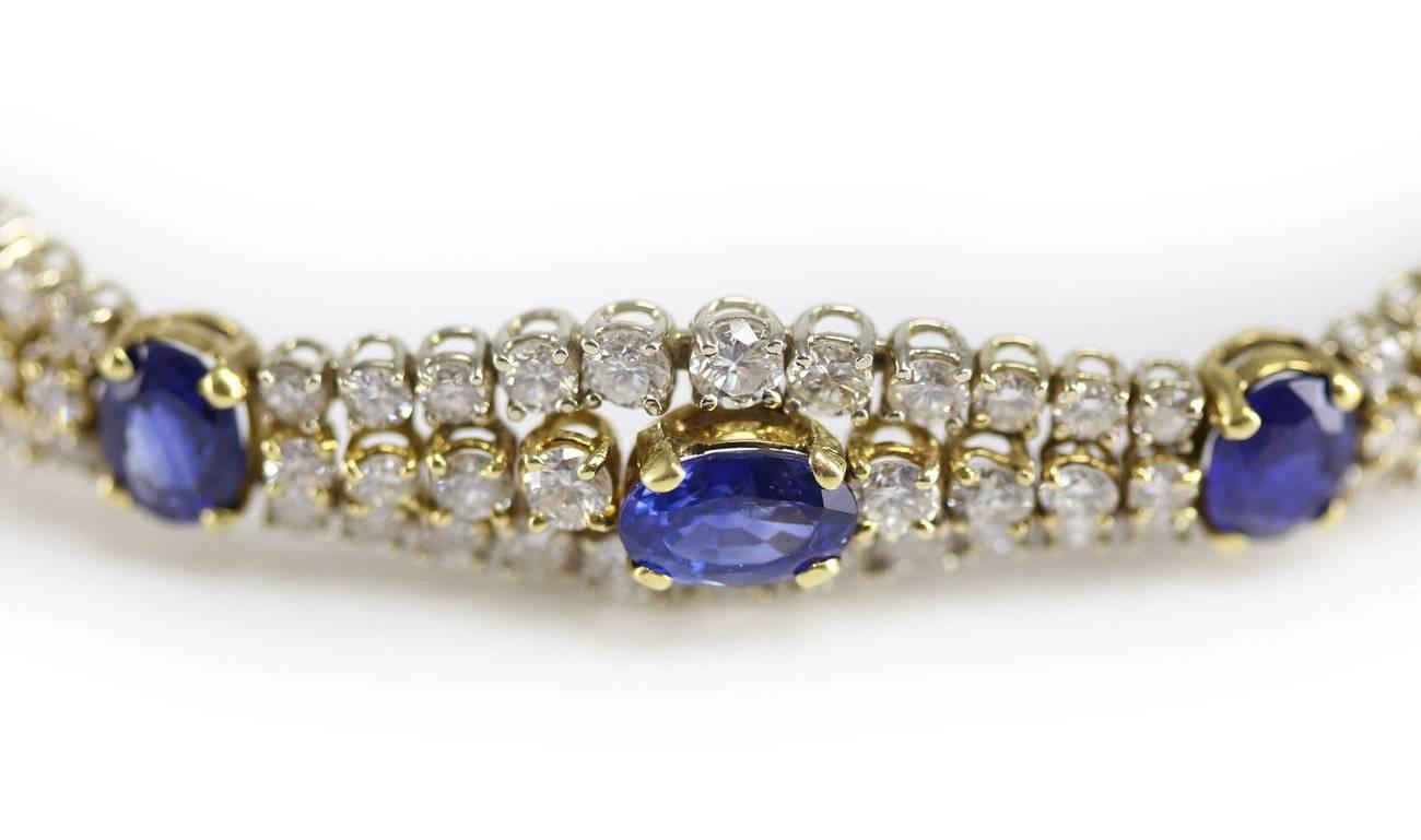 Stunning 18-karat yellow gold bracelet with nine oval sapphires, 150 round diamonds - 16 carats of diamonds. Double safety latch. Oval sapphires range in size from 7.80 x 6.30 mm to 7.20 x 6.25 mm and weighing a total of 14.50-carats. Enhanced by