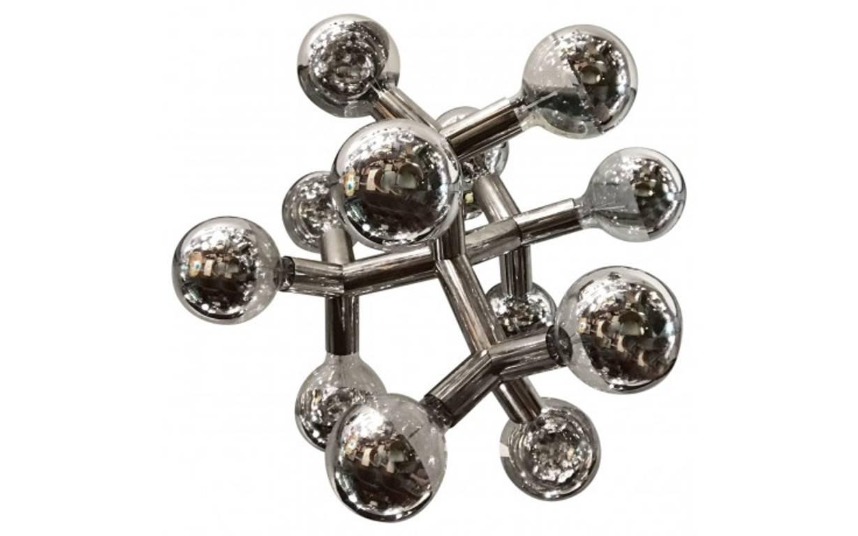 Modern midcentury chandelier by J.T. Kalmar from Austrian chandelier firm Kalmar and spent his life collaborating with revered architects to make truly innovative pieces that changed perceptions on lighting. This modern nickel-plated and chrome