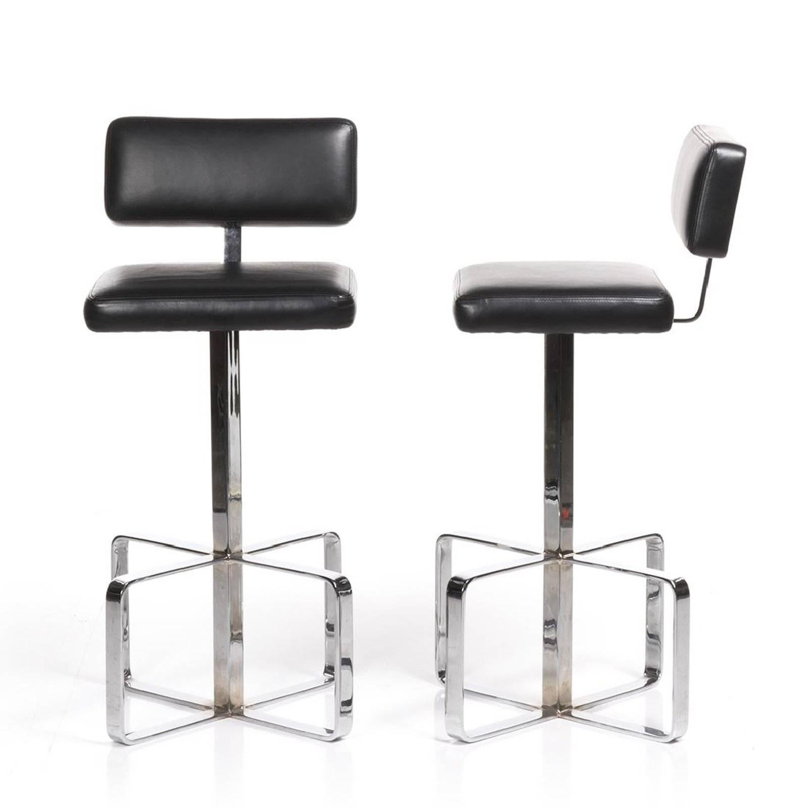 Pair of Italian leather and chrome swivel bar stools, circa 1970s.
In excellent used condition.
  