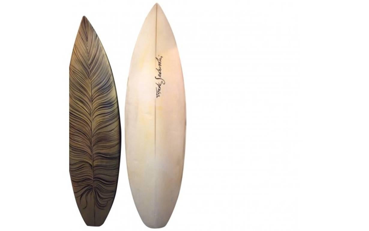 Tomek Sadurski is a versatile artist whose work ranges from sophisticated illustrations and collages, to typography, graphic design and even life drawings. Unique and artful, this eye-catching pair of surfboards is part of a limited edition series.