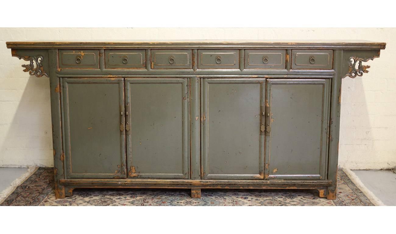 Chinese sideboard, painted green lacquer, mahogany drawers, 19th century.
Has not been refinished, original patina.
