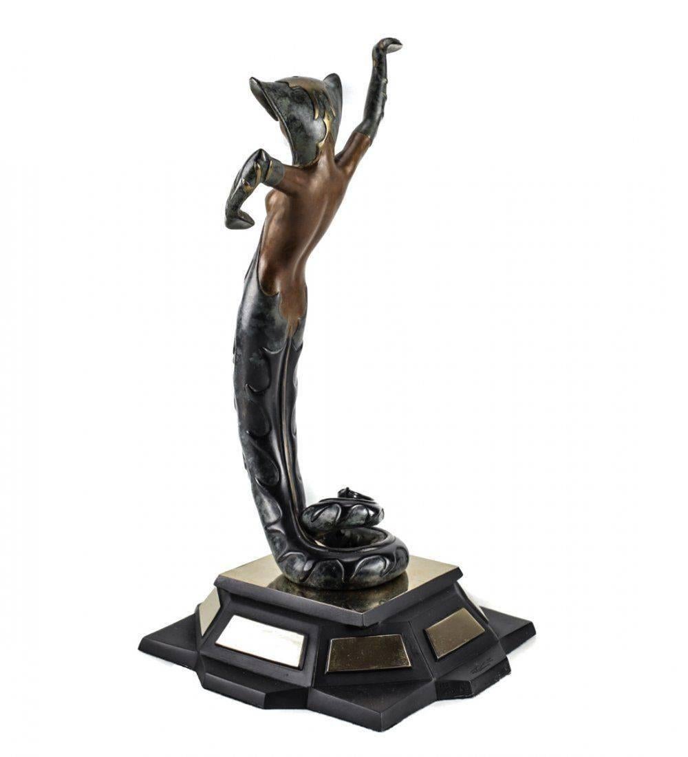 A decorative and vibrant Erte (French, 1892–1990) bronze sculpture titled 