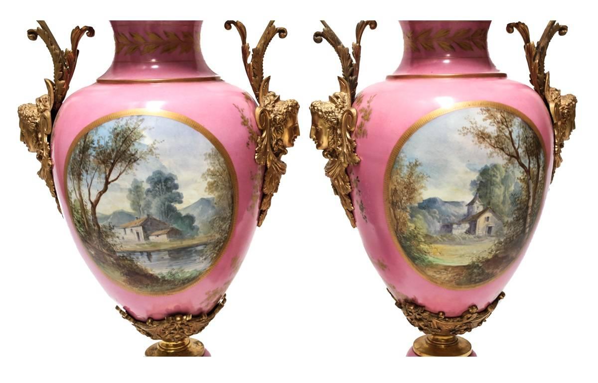 Bronze 19th Century Palatial Pair of Ormolu-Mounted Sevres Urns For Sale