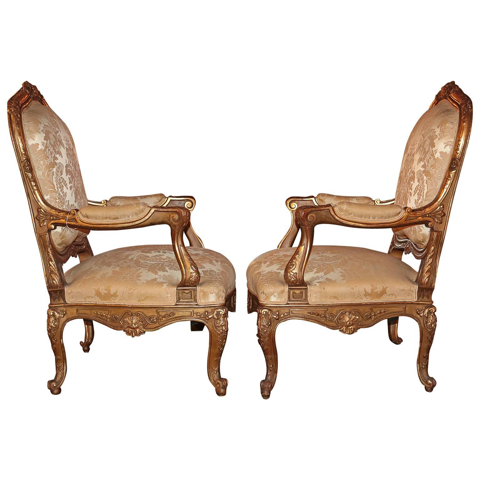 These 19th century giltwood armchairs are some of the best you have ever seen. The quality in craftsmanship is second to none. From the crown to the ball feet, the finely carved details show the true beauty of this masterpiece set. When it comes to