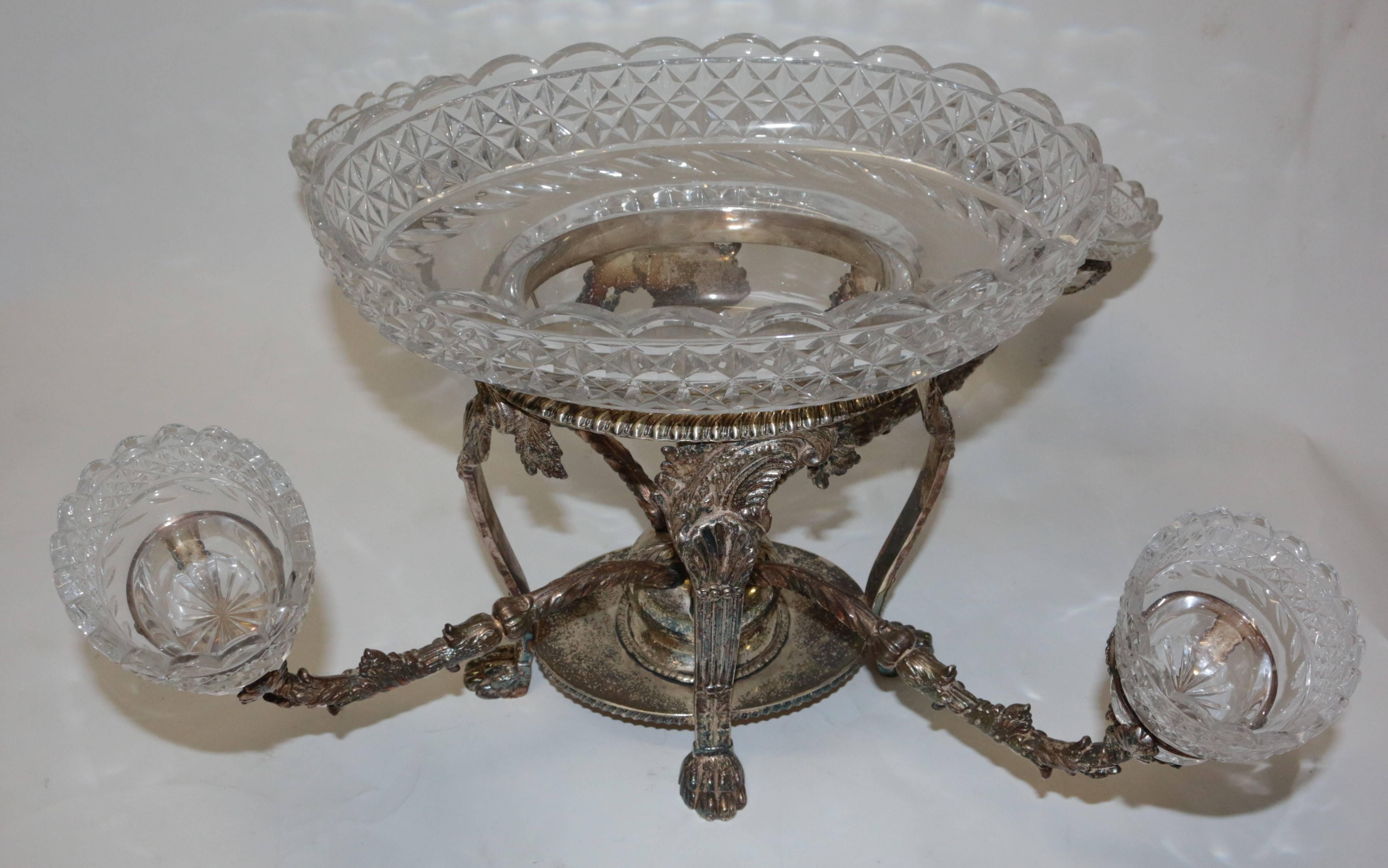 This 19th century English silver plated centrepiece is in amazing condition. The crystals are in great shape.
The smaller cut crystal measures:
5.5 x 3.5
crystal centrepiece measures:
12.5 x 8.5.
 