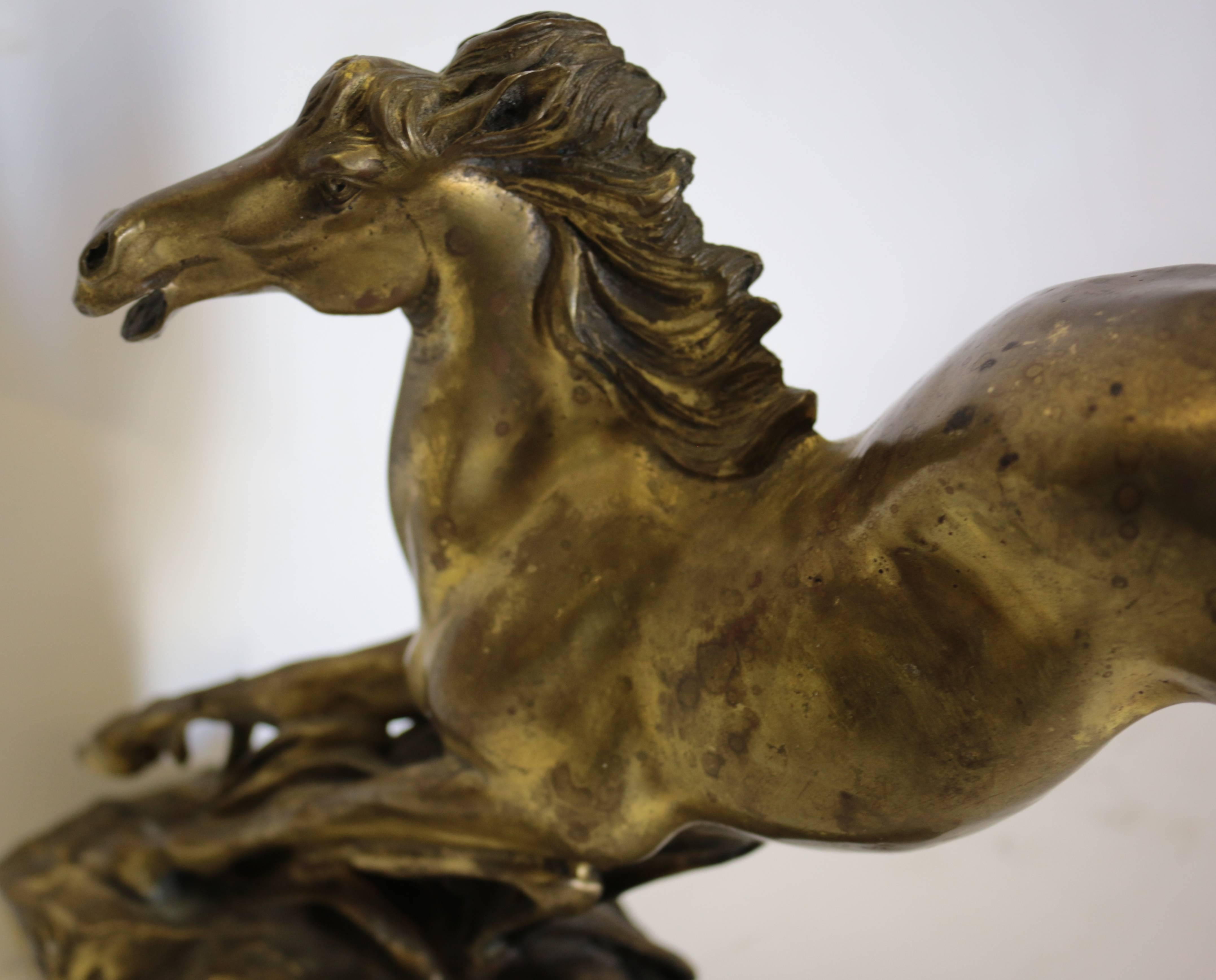 Beautiful decorative bronze Italian horse statue with a very rich gold patina. In excellent used condition.