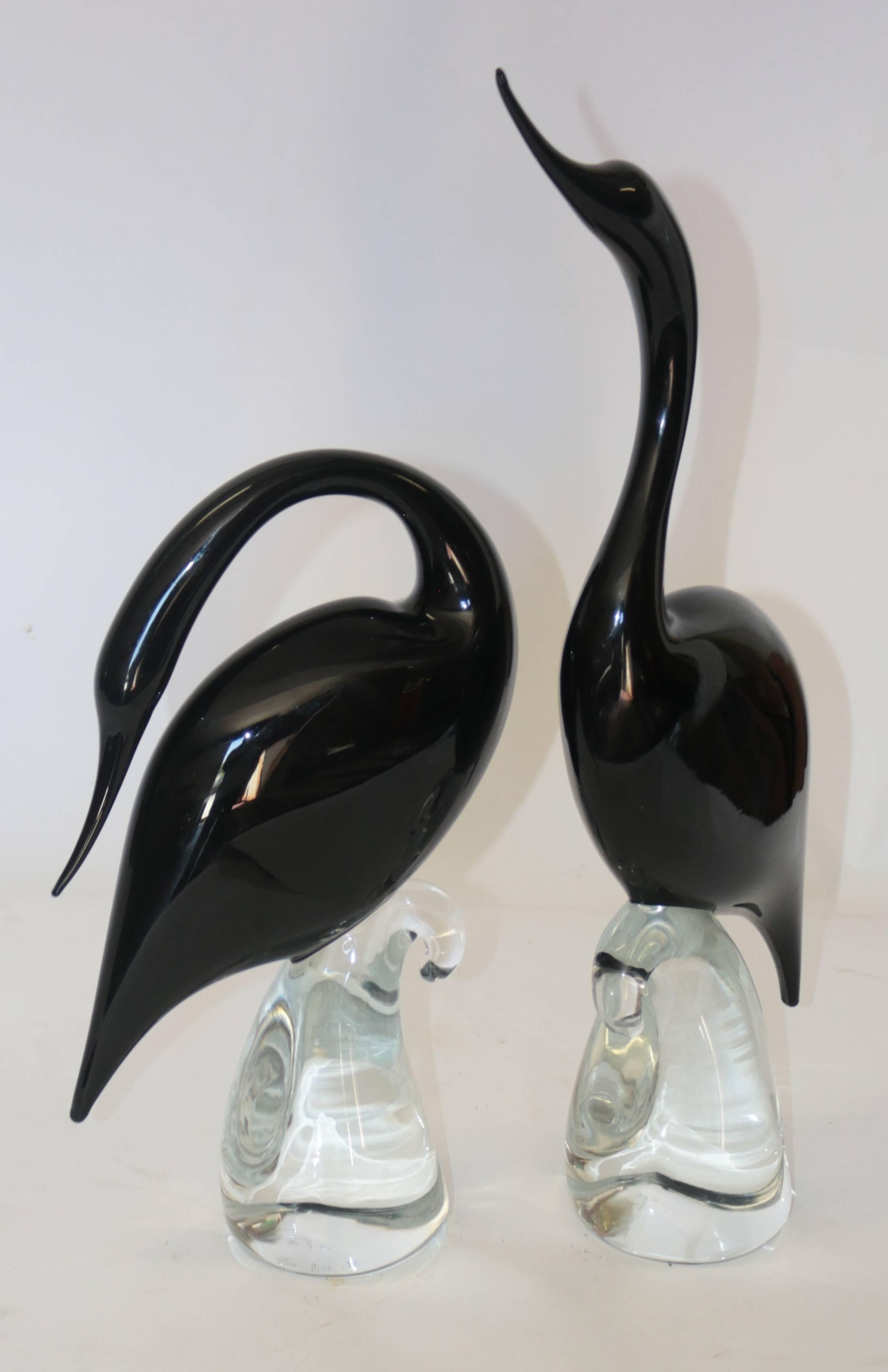 Great pair of signed modern Murano birds resembling two companion birds. This great pair shows strength and beauty. These two companion birds are great together or separate. Each goose is signed G. Formia and Giulia Poalilli. The great black color