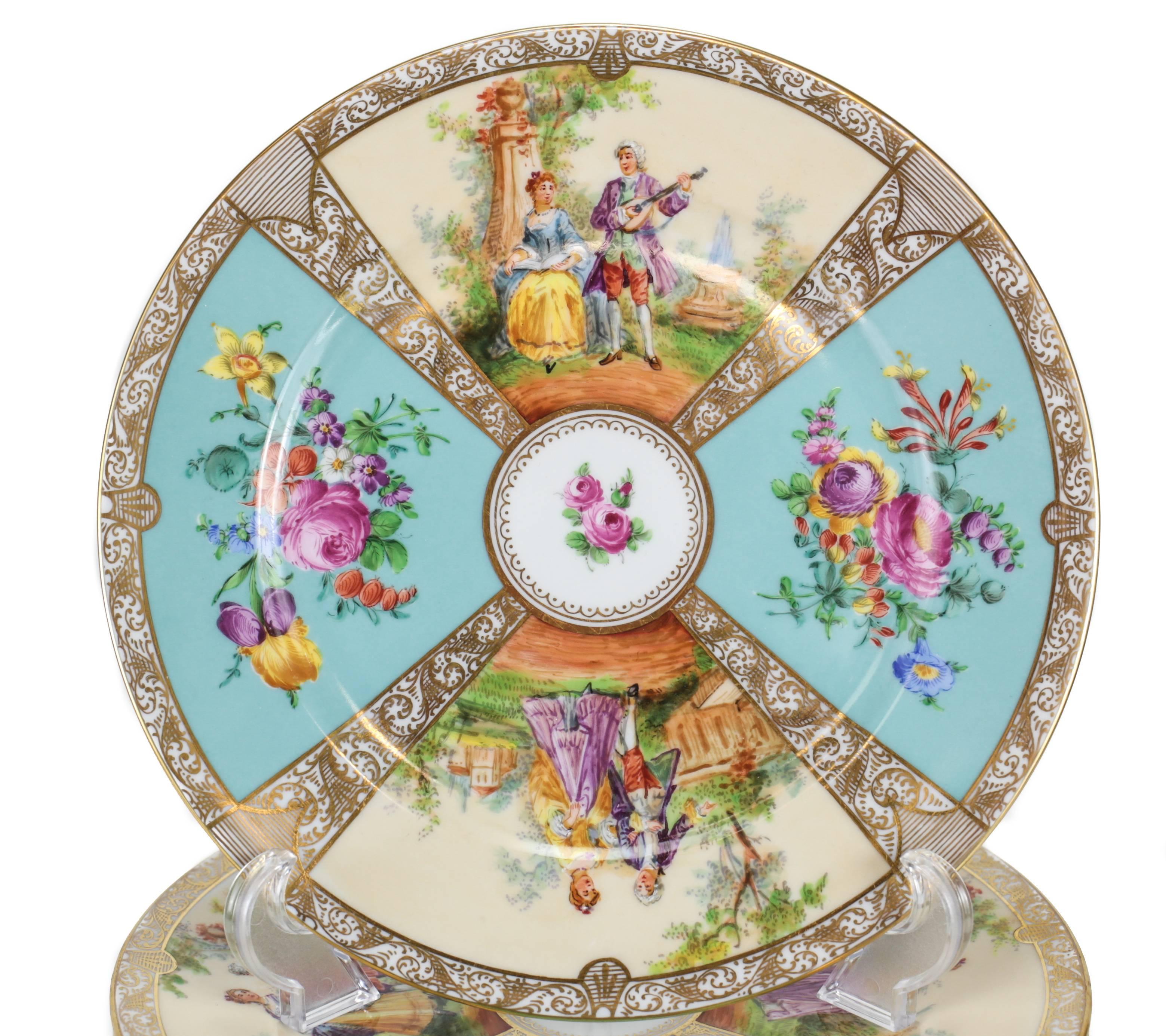 A beautiful and colorful set of 12 cabinet plates with a quatrefoil decoration of interchanging outdoor scenes and floral bouquets. The decoration by well regarded Dresden painted Ambrosius Lamm.

Each with makers mark for Dresden and artists mark