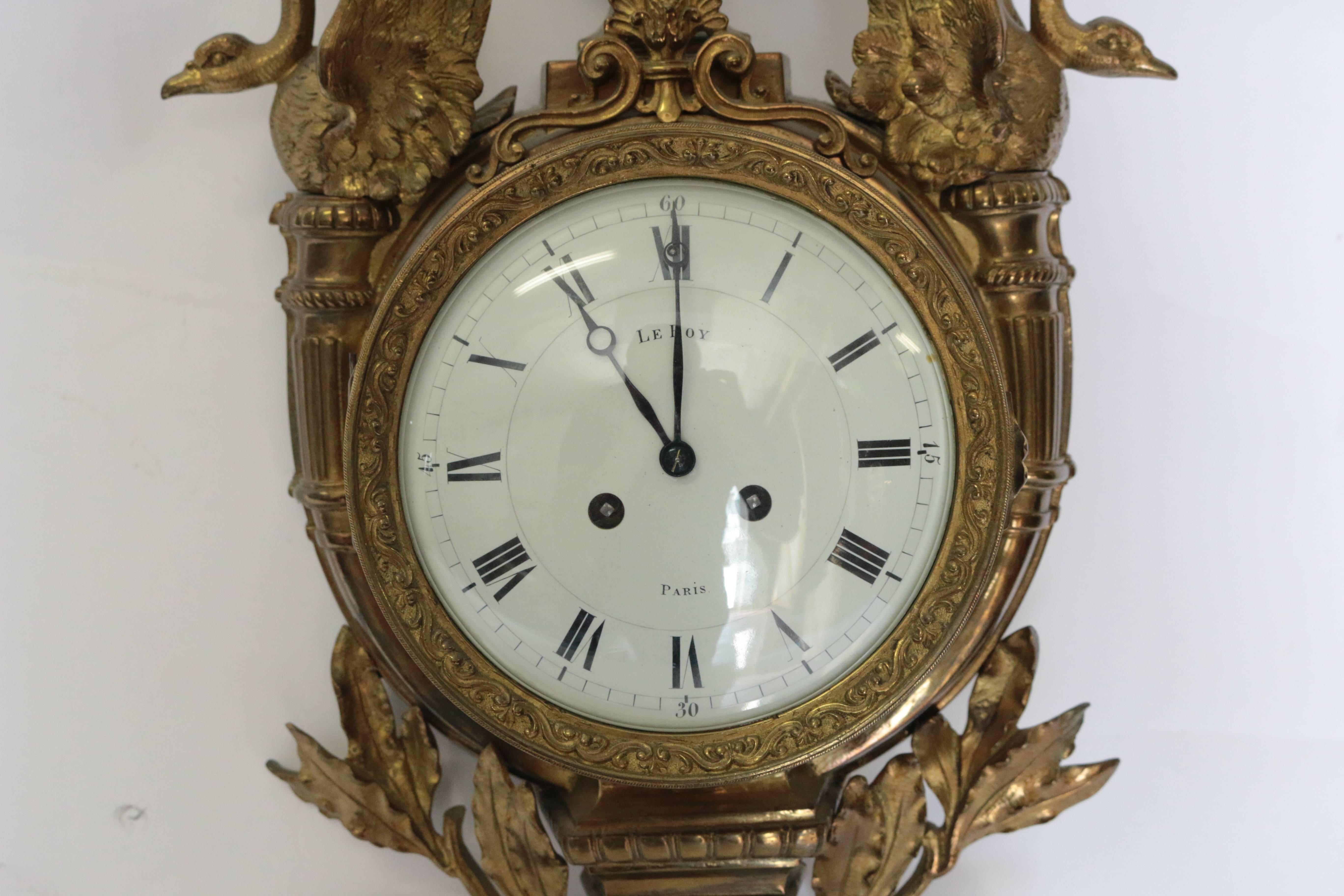 Made by one of the most word's finest makers of antique clocks LeRoy.
This elegant Empire wall clock is made of bronze with swans on each side.
Original porcelain face.
Original gilding.
In excellent used condition.