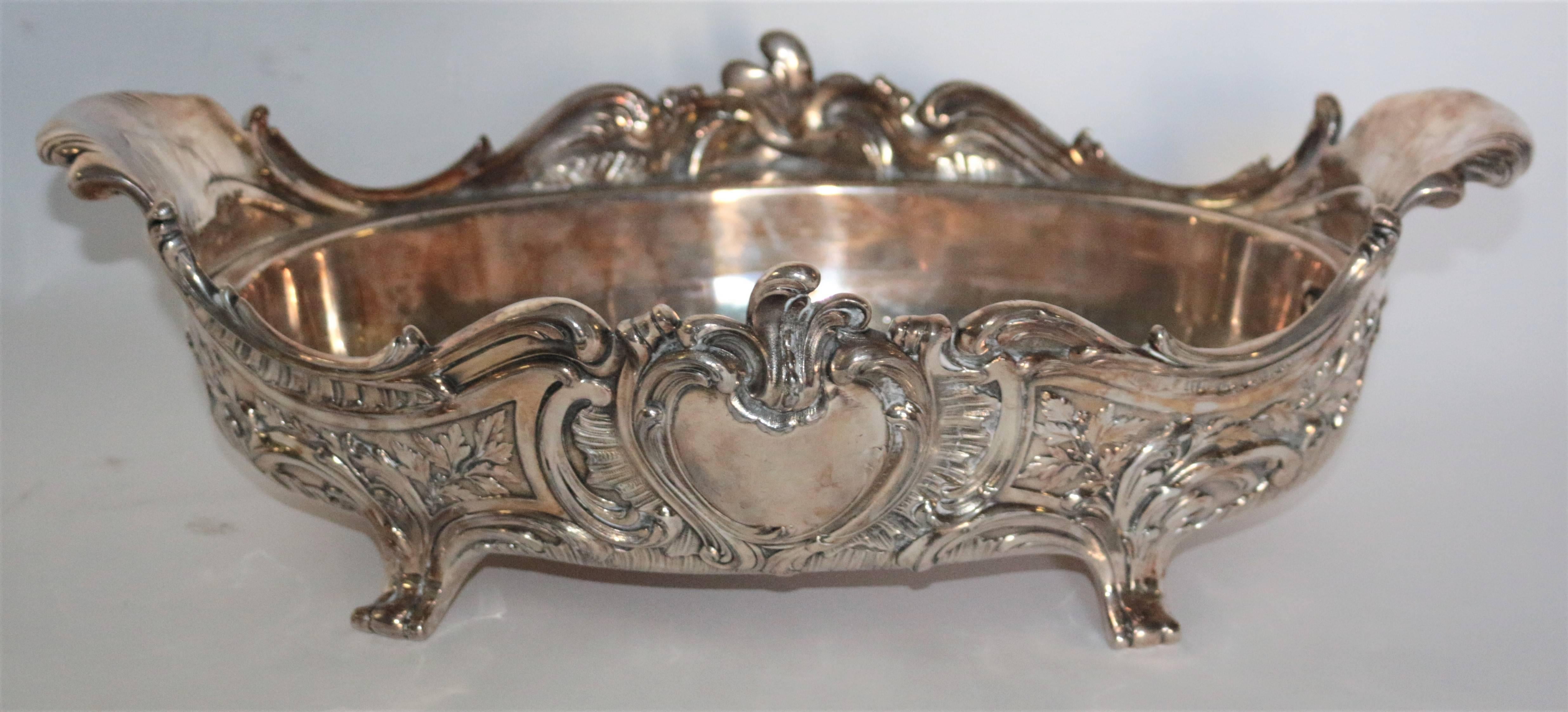 A silver plated center bowl by Christolfe stamped to underside. With original liner. Overall good condition with wear and plate loss to liner.