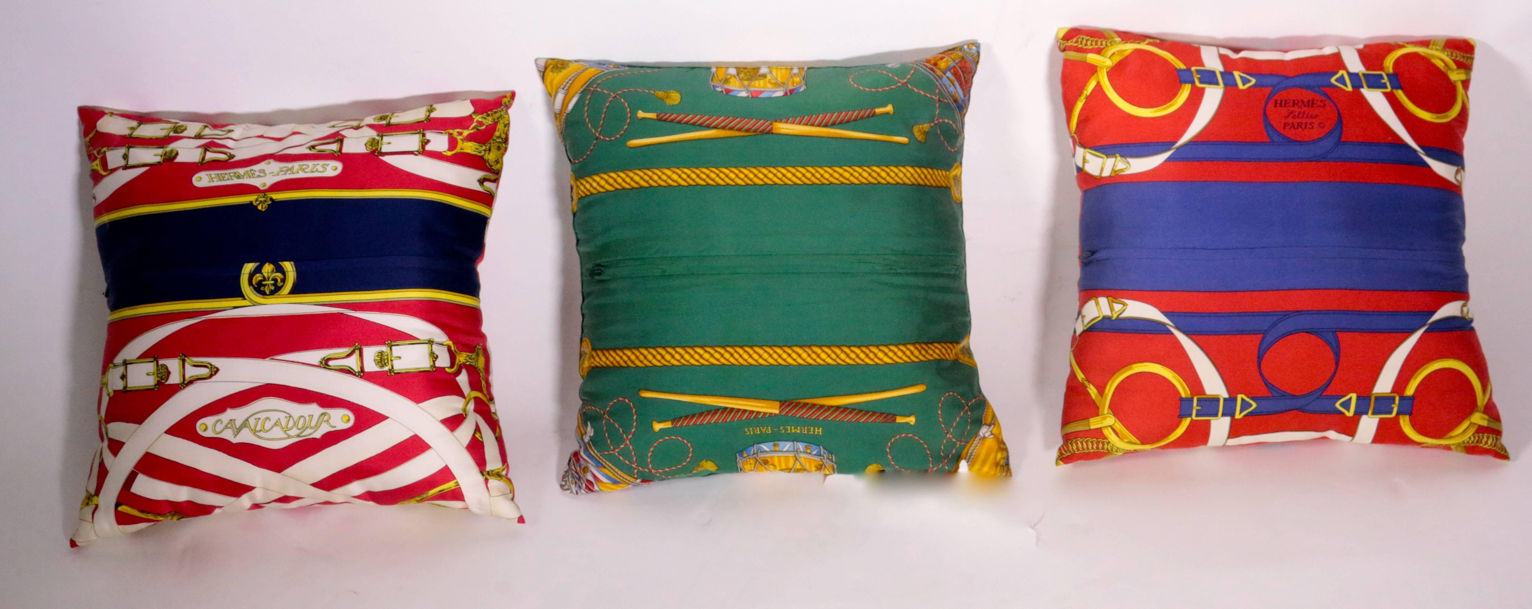 Set of three silk two sided Authentic Hermes pillows.
Zipper closure.