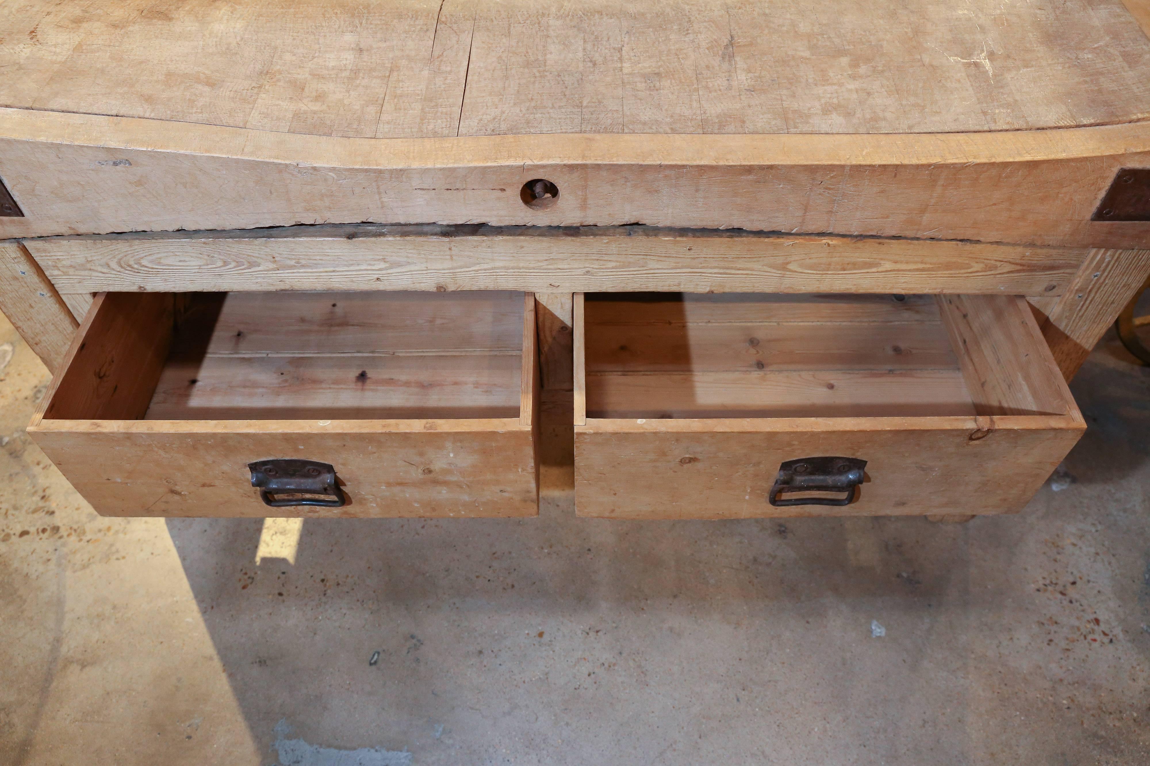 French butcher table in maple and pine. Metal brackets and hardware. Two drawers in base.
