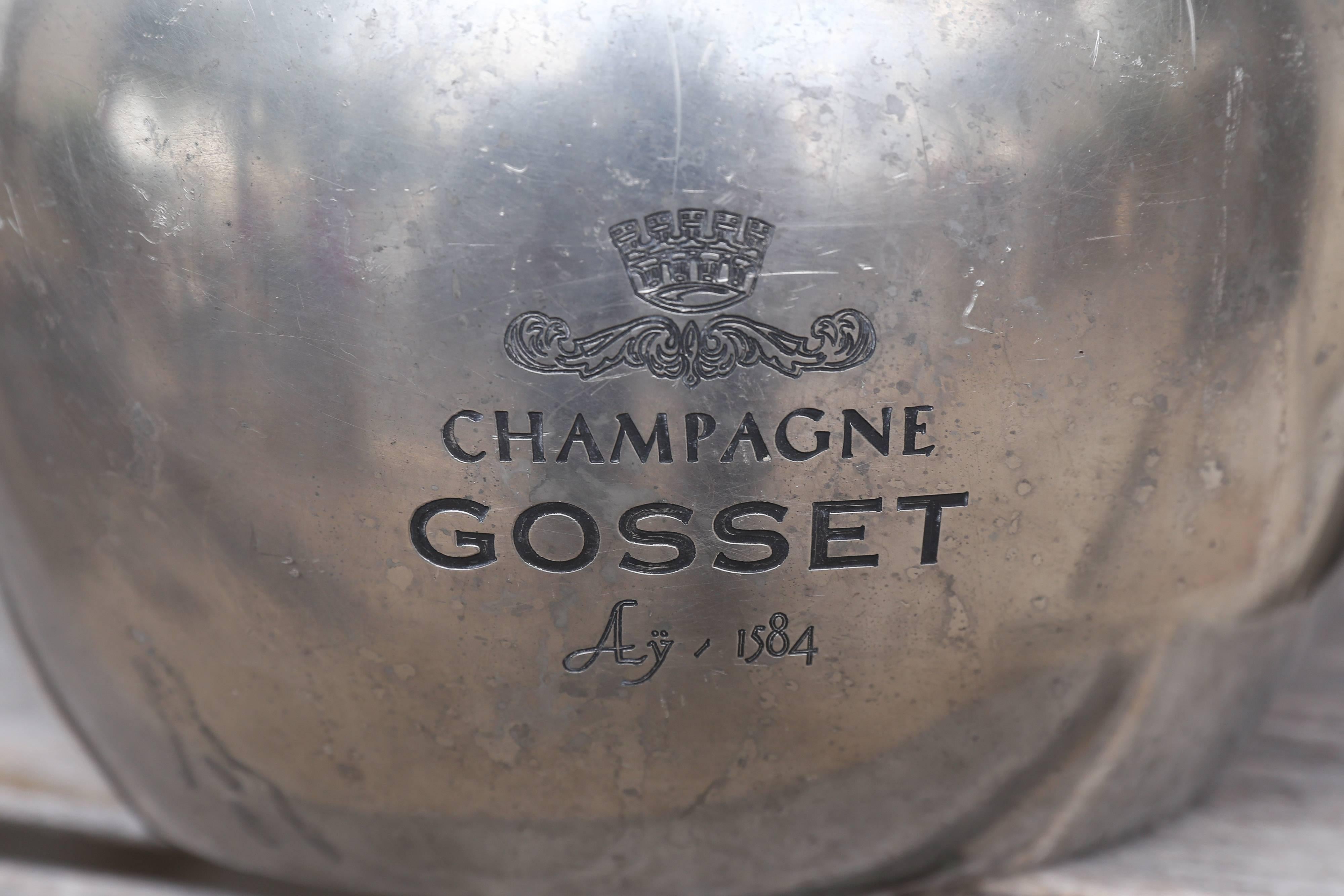 Exquisite pewter champagne cooler from Gosset, the oldest wine house in Champagne. With highly detailed Art Nouveau handles, this is a beautiful marriage of form and function.