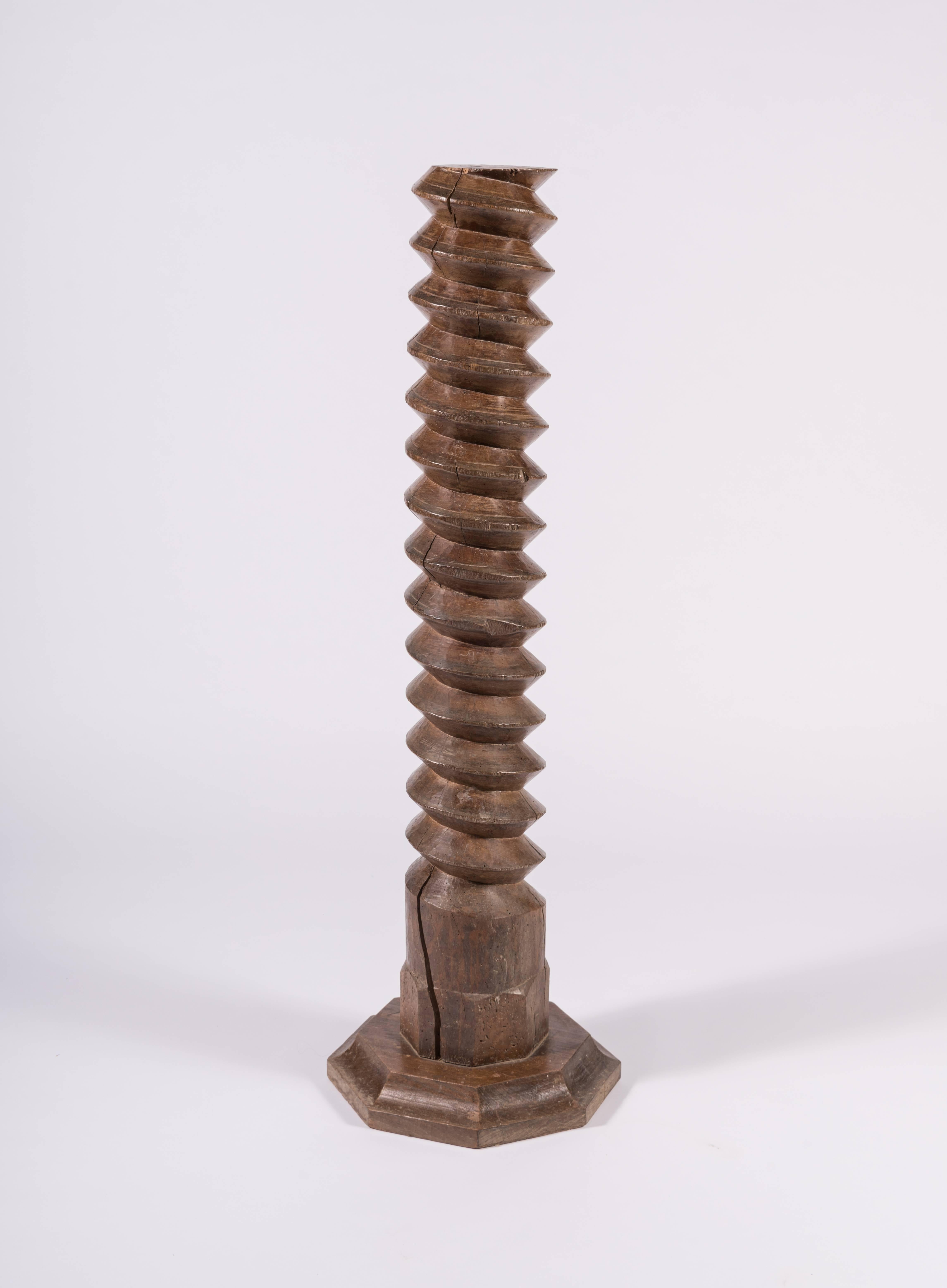 Handmade in France, a vintage wine press screw that can quickly become a fabulous floor lamp, can be used as a pedestal, or can simply stand alone as a curious piece of art. On a 16 inch octagonal stepped base, there are a few sizable cracks in the