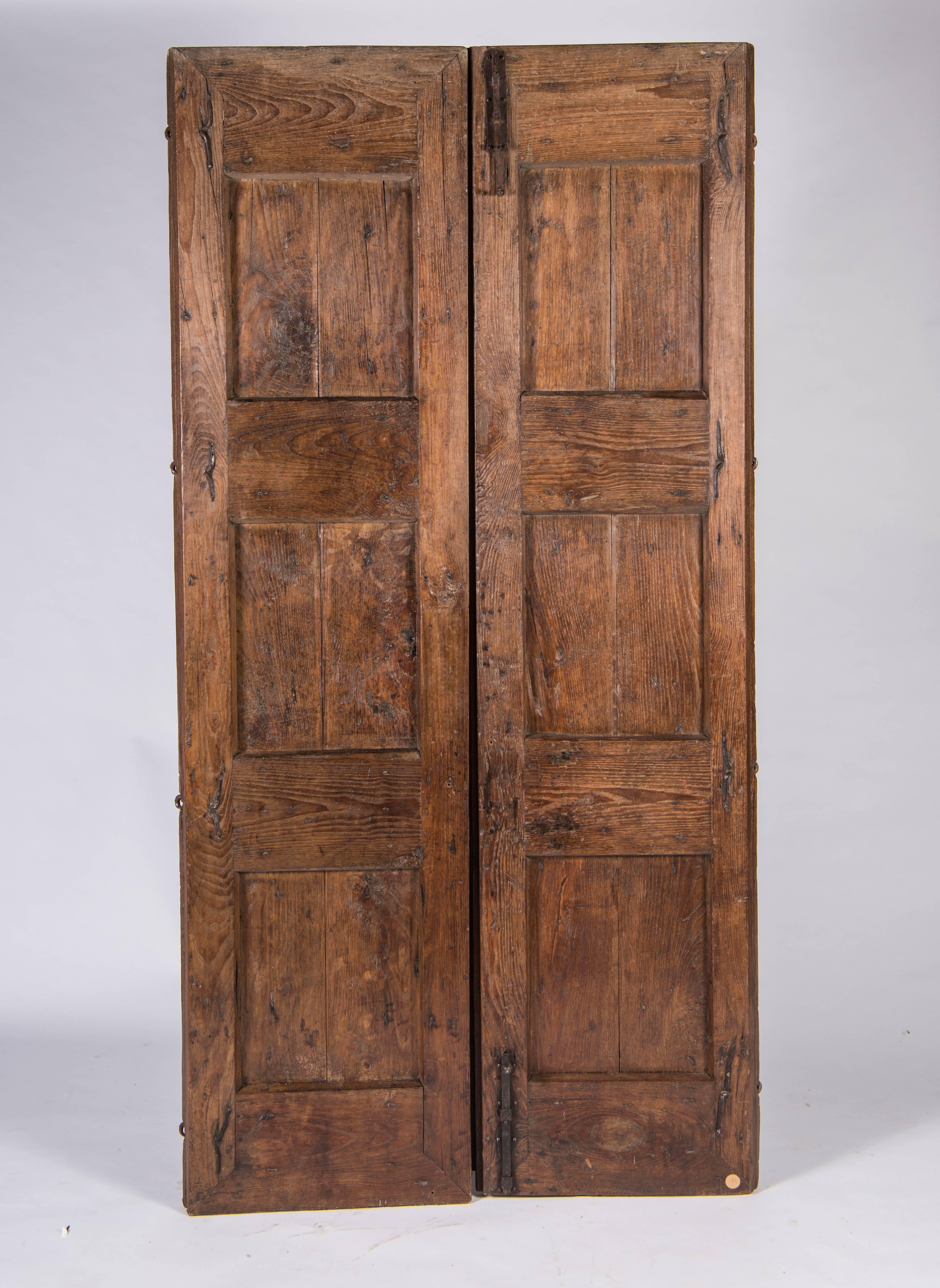A truly exceptional pair of handcrafted doors. Solid and exceptionally heavy.
Two pair available. Sold separately.
