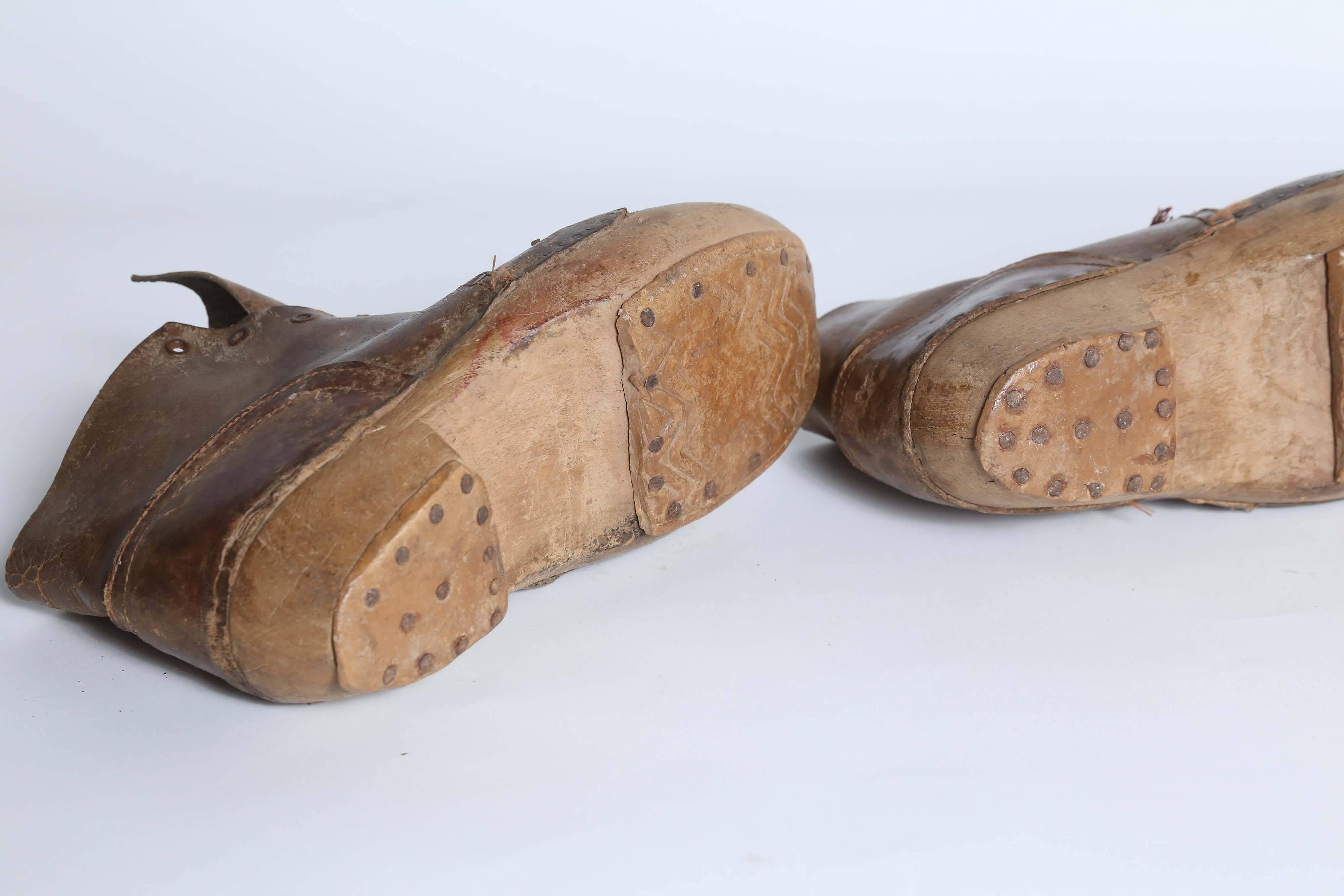 Pair of Old Wooden Shoes In Fair Condition In Houston, TX