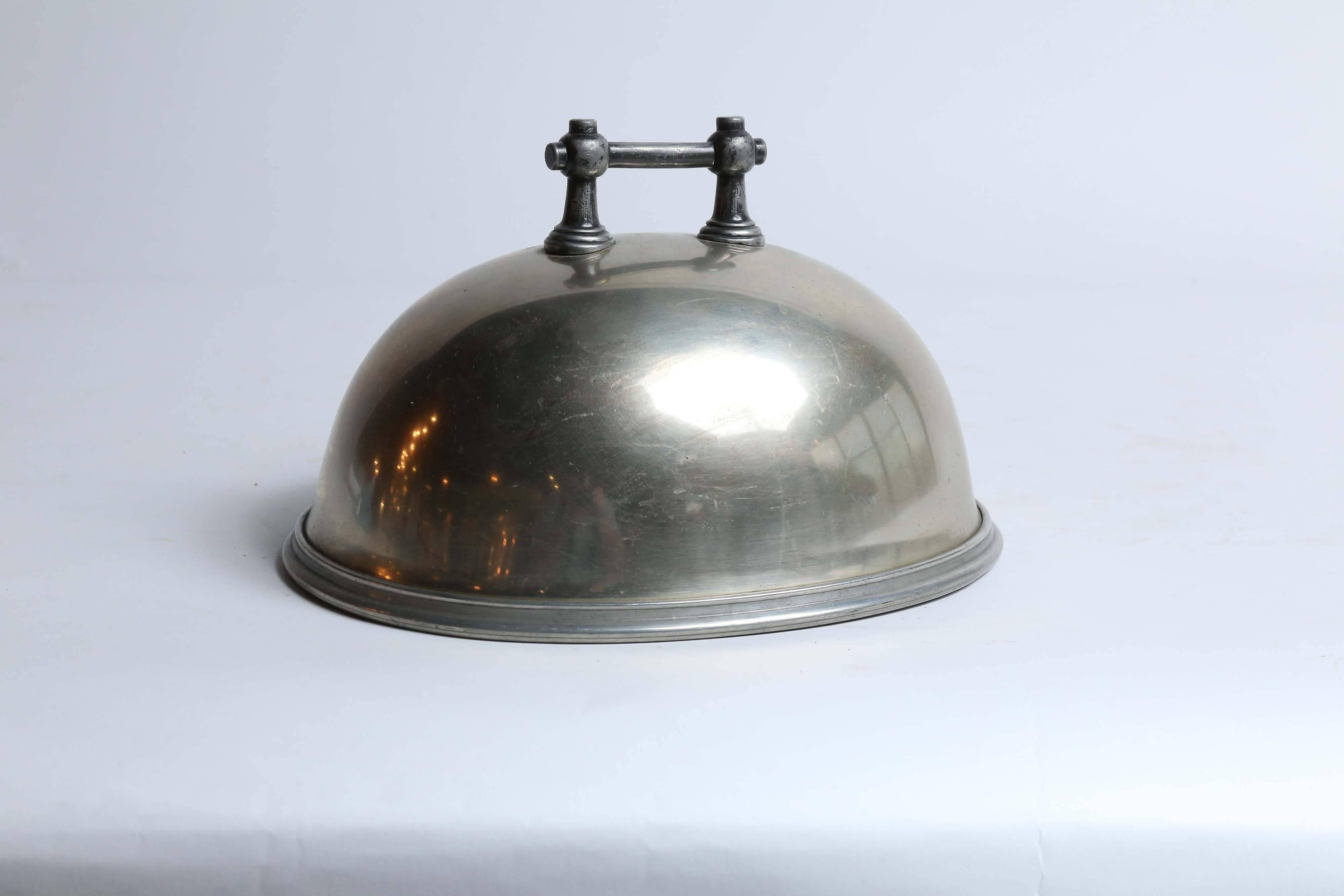 An unusual vintage food dome found in France marked 'Solid Argent Metal' with the makers mark as pictured. Beautiful patina with minor wear as expected.