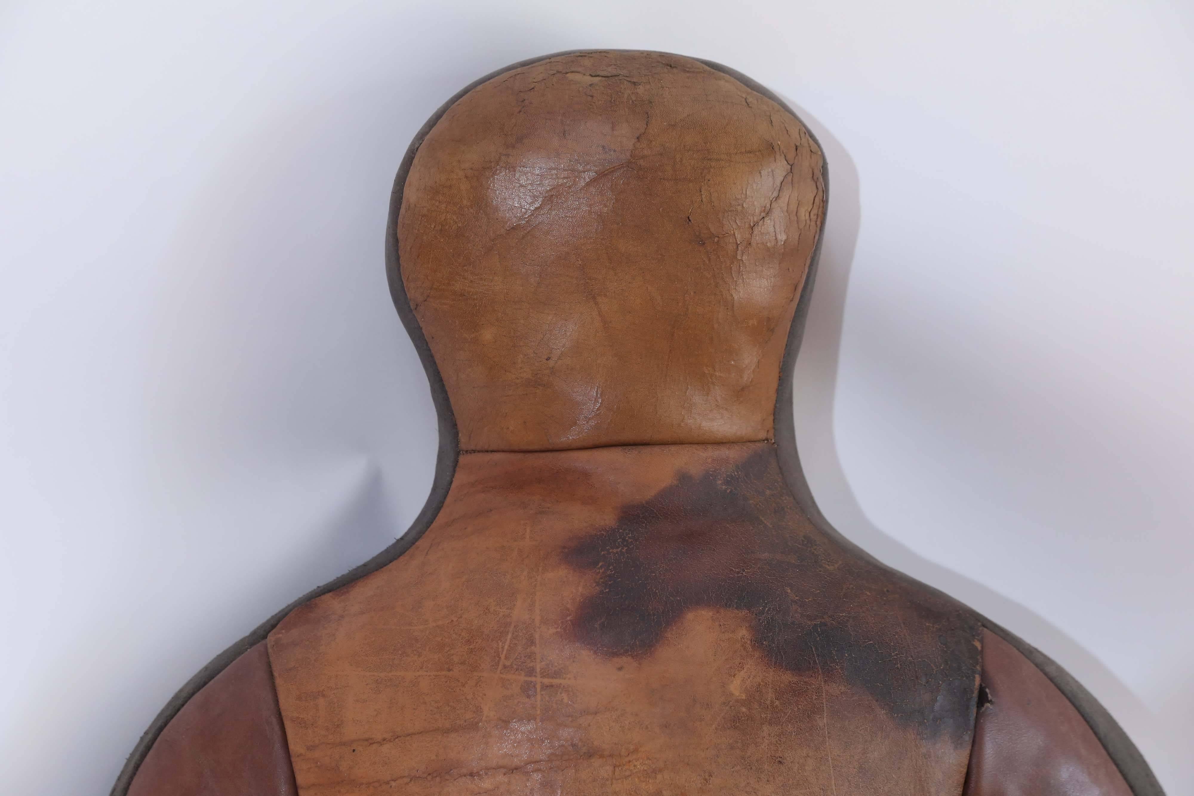 A vintage leather wrestling dummy from France. Also called a throwing dummy, this guy is still in very good condition with no splits or tears. Weighing in at 45 pounds, a bit of fun for the eye or just the right guy to take your frustrations out on.